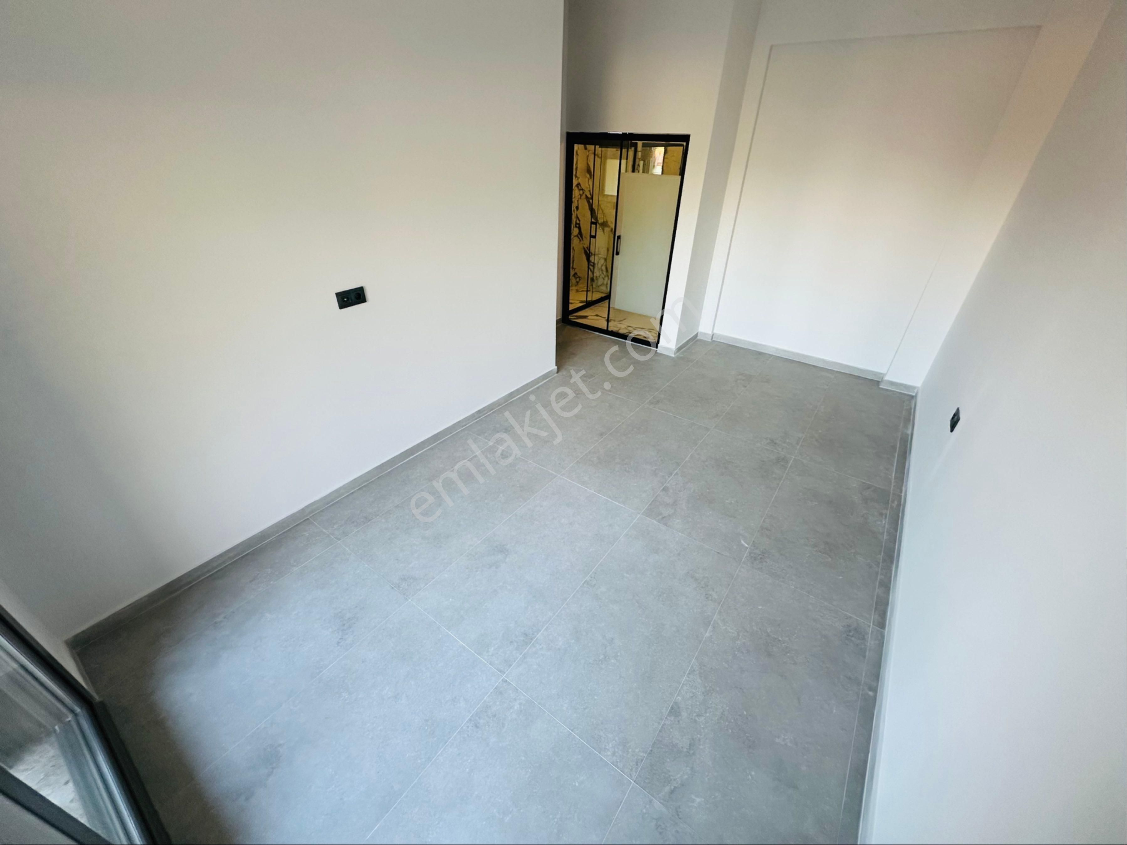 Kuşadası Davutlar Ağaçlıda Konsept 2+1 Tek Kat Bahceli Daire - Görsel 12