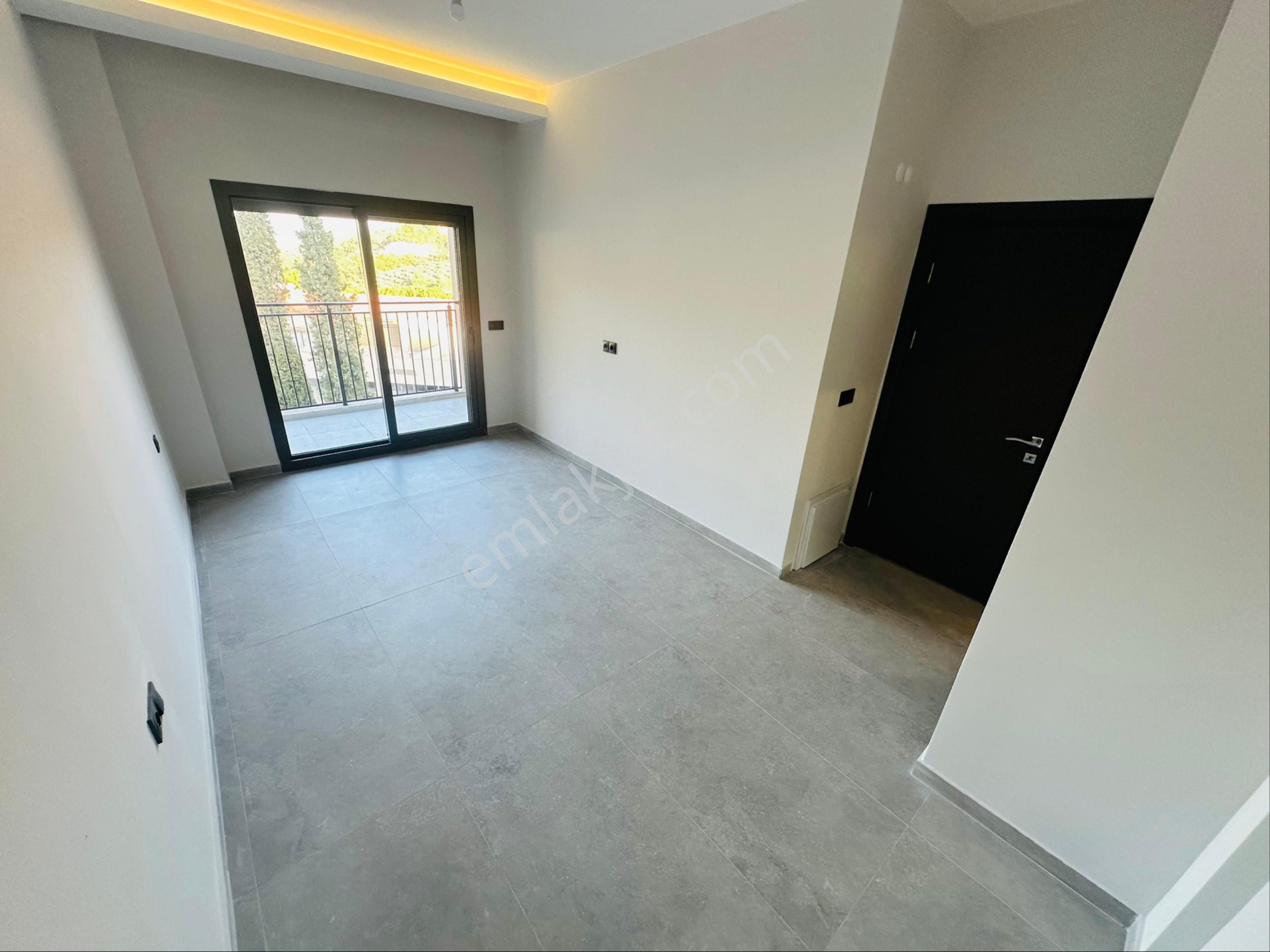 Kuşadası Davutlar Ağaçlıda Konsept 2+1 Tek Kat Bahceli Daire - Görsel 17