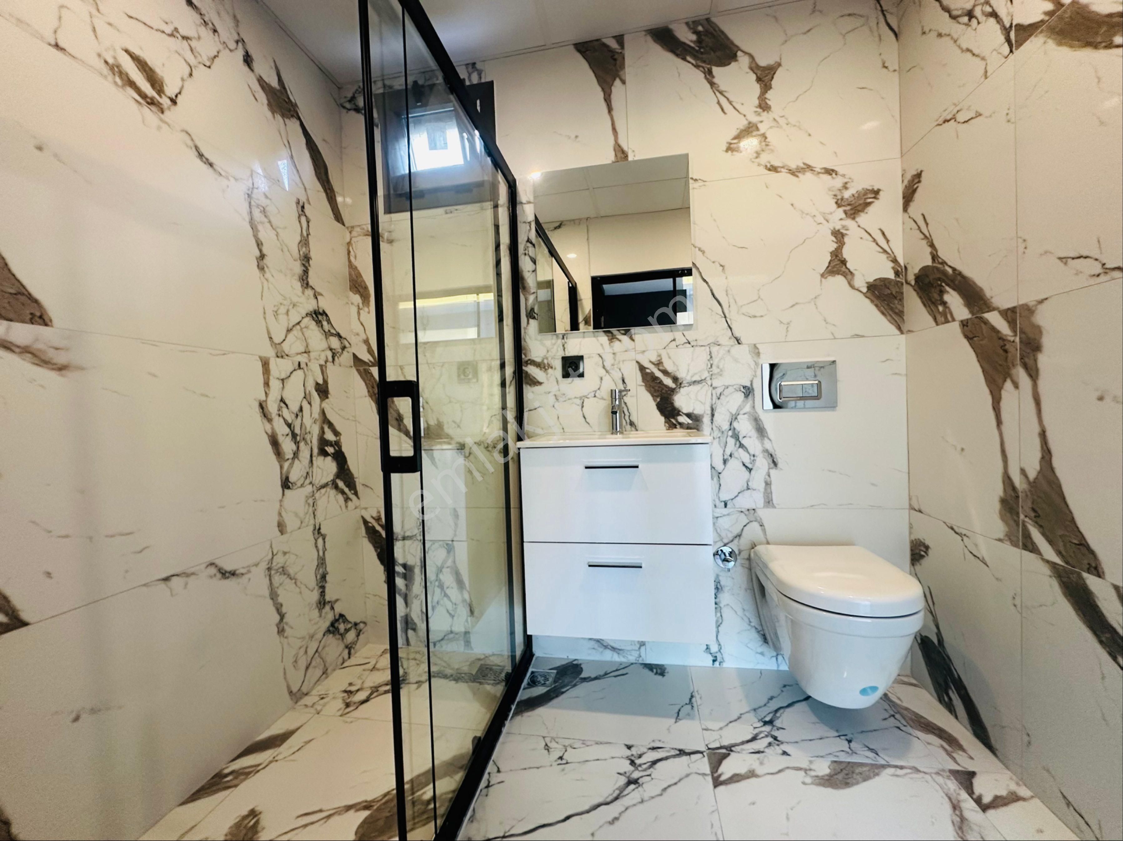 Kuşadası Davutlar Ağaçlıda Konsept 2+1 Tek Kat Bahceli Daire - Görsel 18