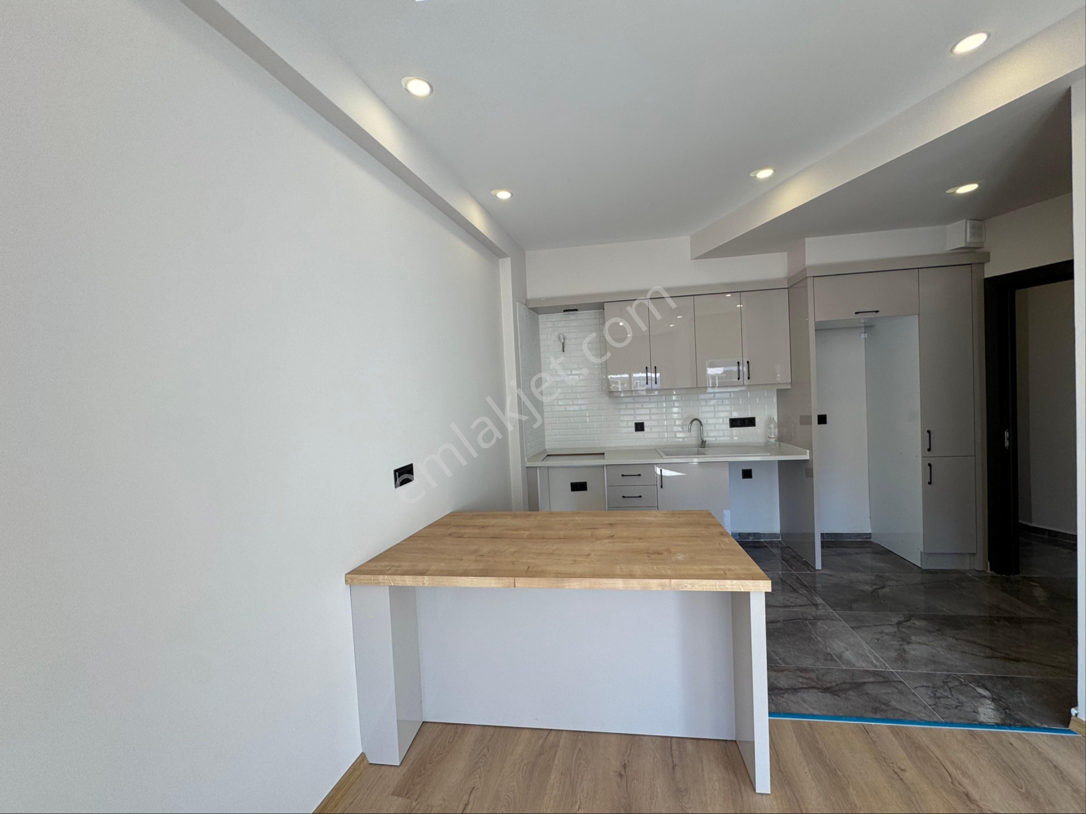 Kuşadası Güzelçamlı Merkezde Sıfır Yapım Ara Kat 2+1 Daire - Görsel 21