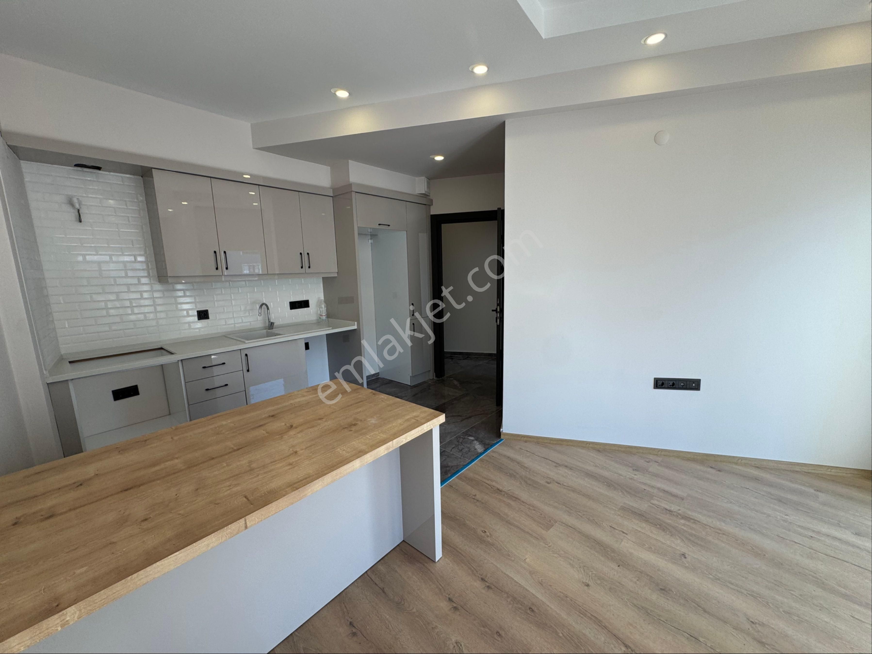 Kuşadası Güzelçamlı Merkezde Sıfır Yapım Ara Kat 2+1 Daire - Görsel 23