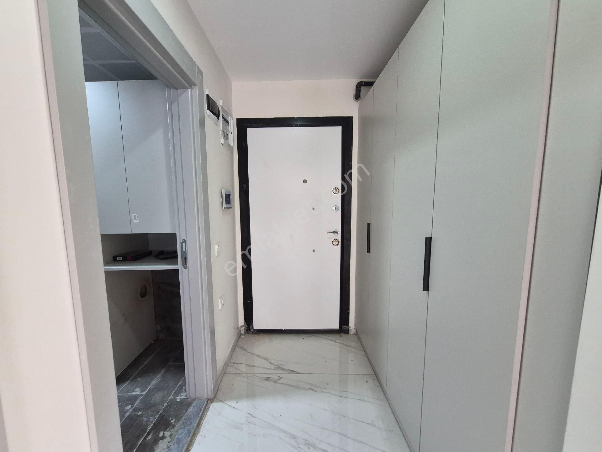 Havuzlu Sitede Kapalı Otoparklı Kombili Dogalgazlı Sıfır Binada Ara Katta 2+1 - Görsel 13