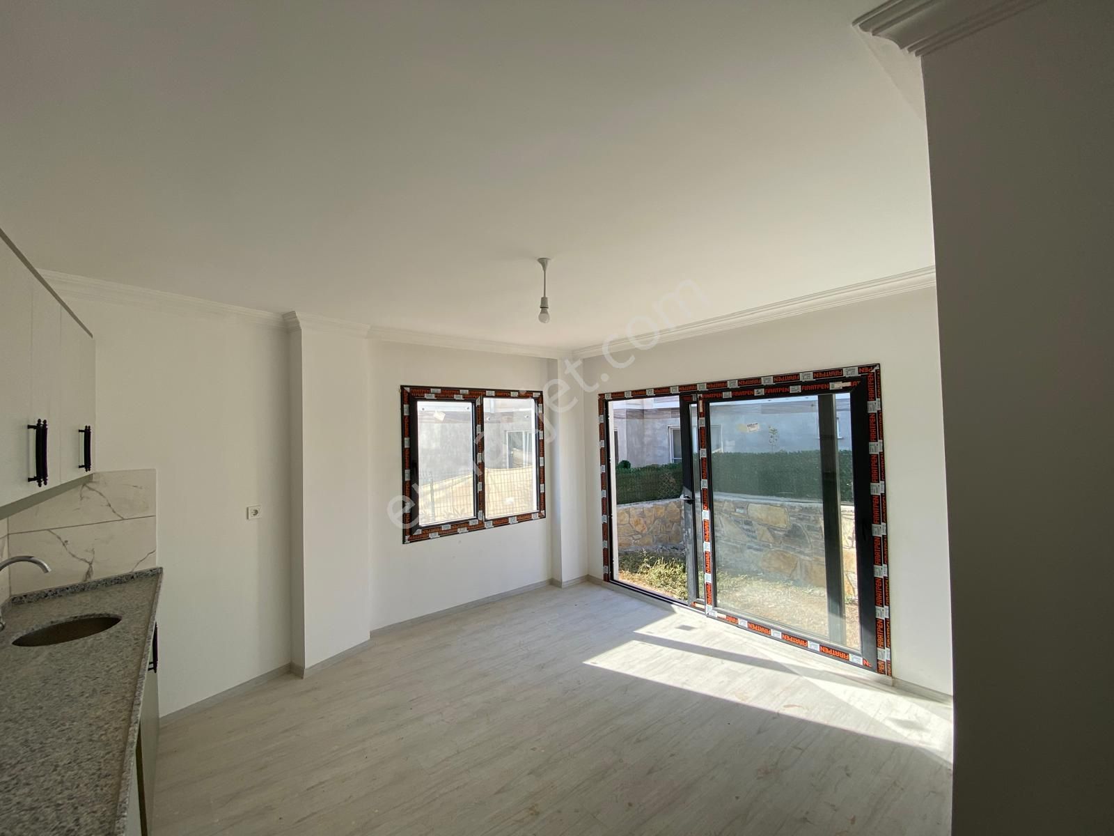 Mumcular'da 1+1 Bahçe Katı Kiralık Daire