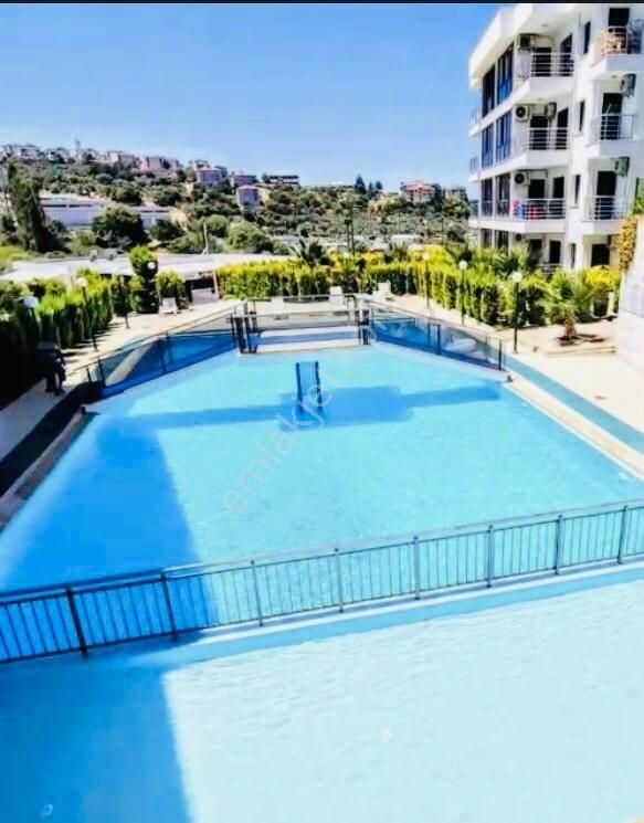 Kuşadasında Güvenlikli Havuzlu Sitede Bahçeli Boş Geniş 2+1 - Görsel 23