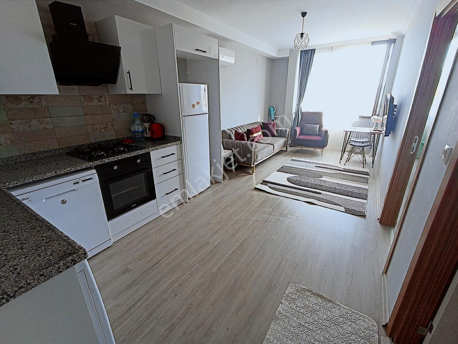 Atıcı'dan Belediye Yanında Kiracılı Eşyalı 1+1 Satılık Daire