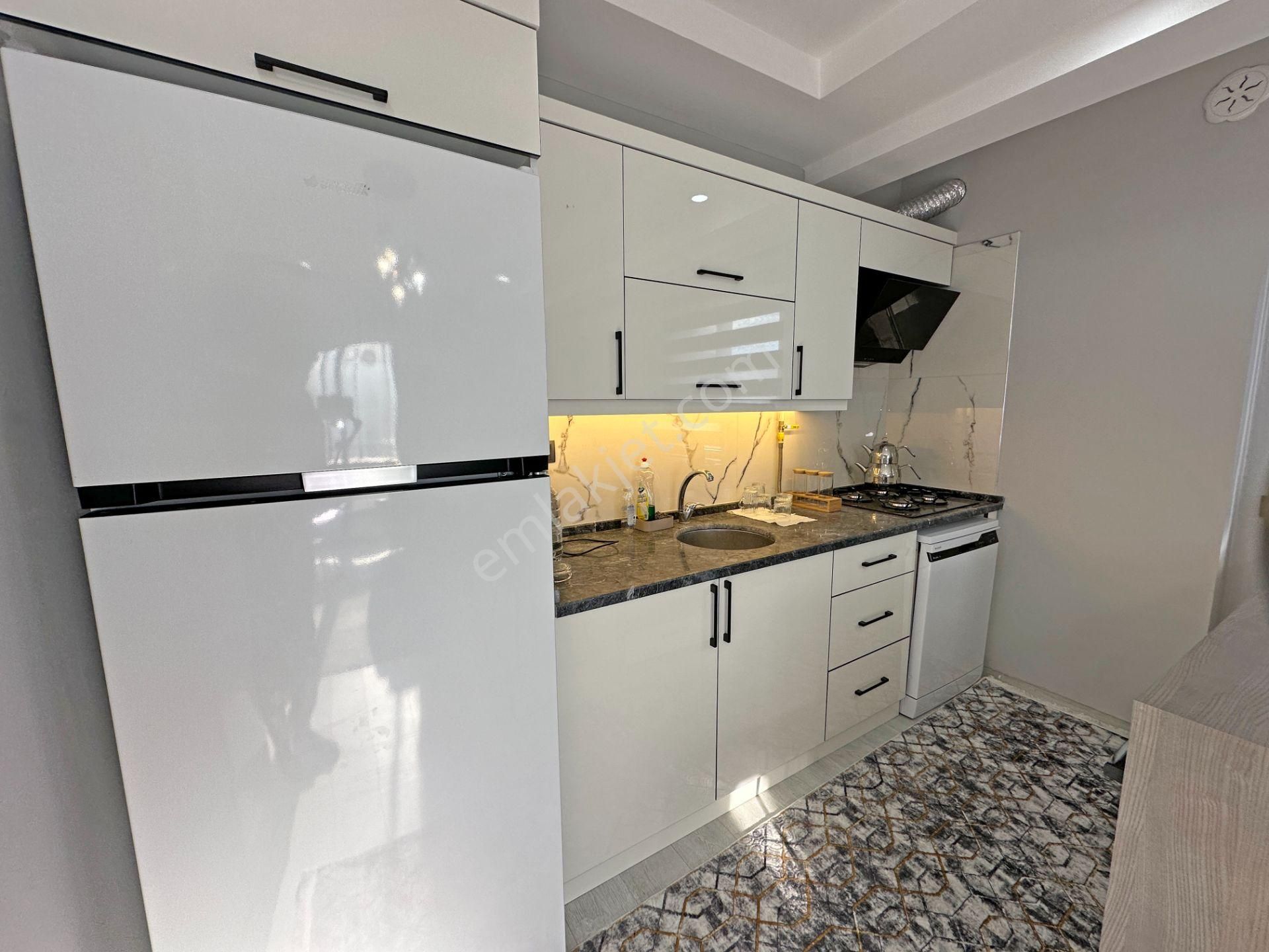 Hüseyin Boylu'dan Körfez'de Satılık Eşyalı 1+1 Daire - Görsel 22