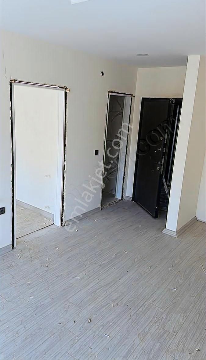 Kuşadası İkiçeşmelikte Havuzlu Kapalı Garajlı Sitede Satılık 1+1 - Görsel 9