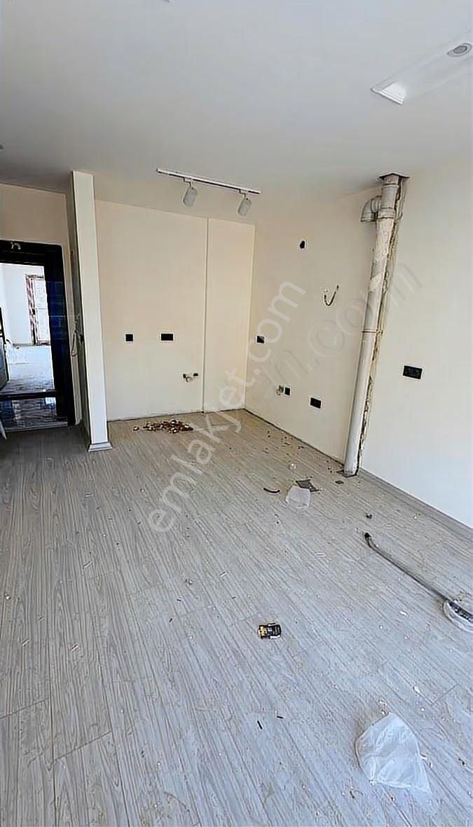 Kuşadası İkiçeşmelikte Havuzlu Kapalı Garajlı Sitede Satılık 1+1 - Görsel 10