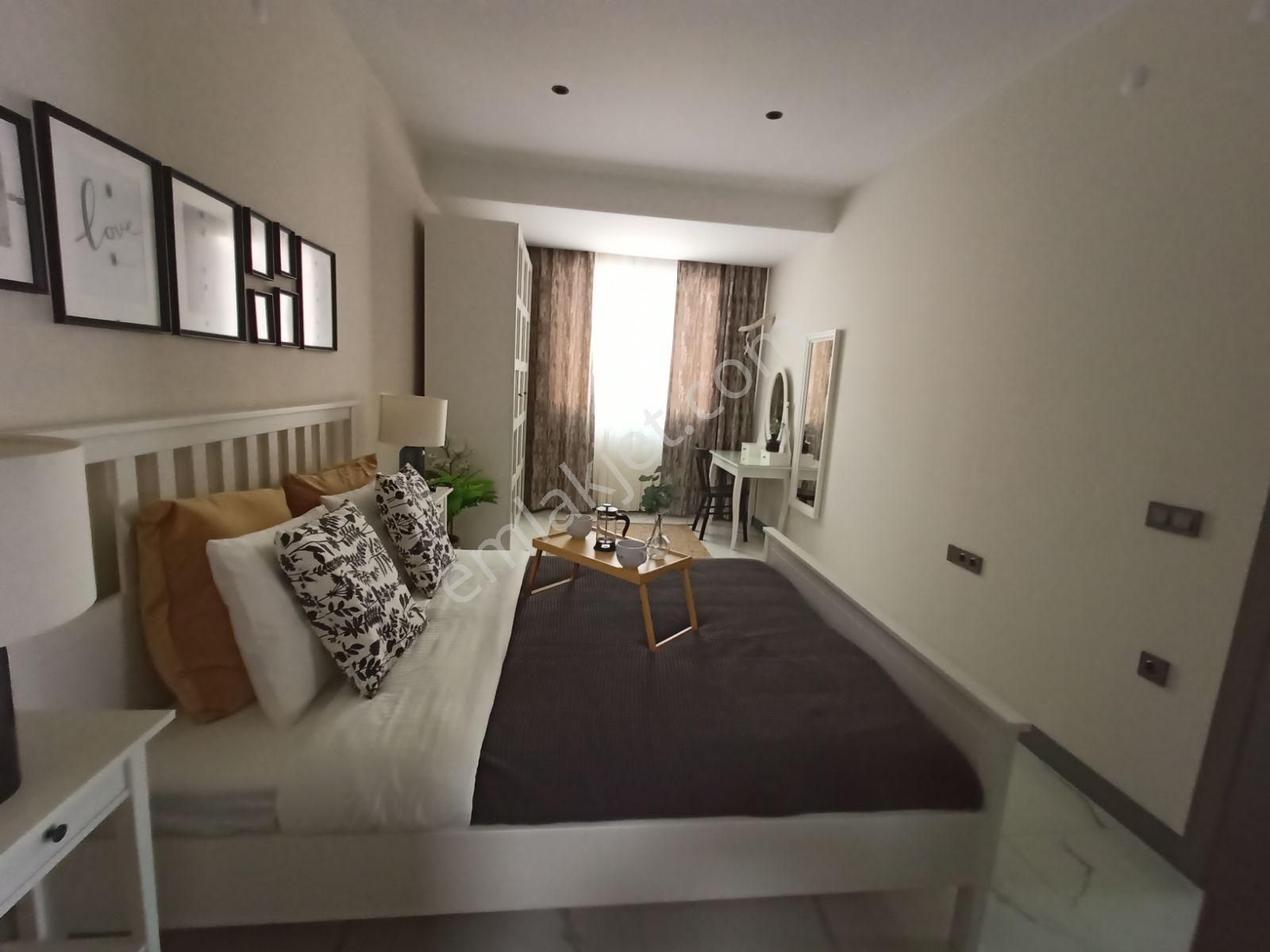 Kuşadası Merkezinde Doğalgazlı Havuzlu Sitede 2+1 Daire - Görsel 11