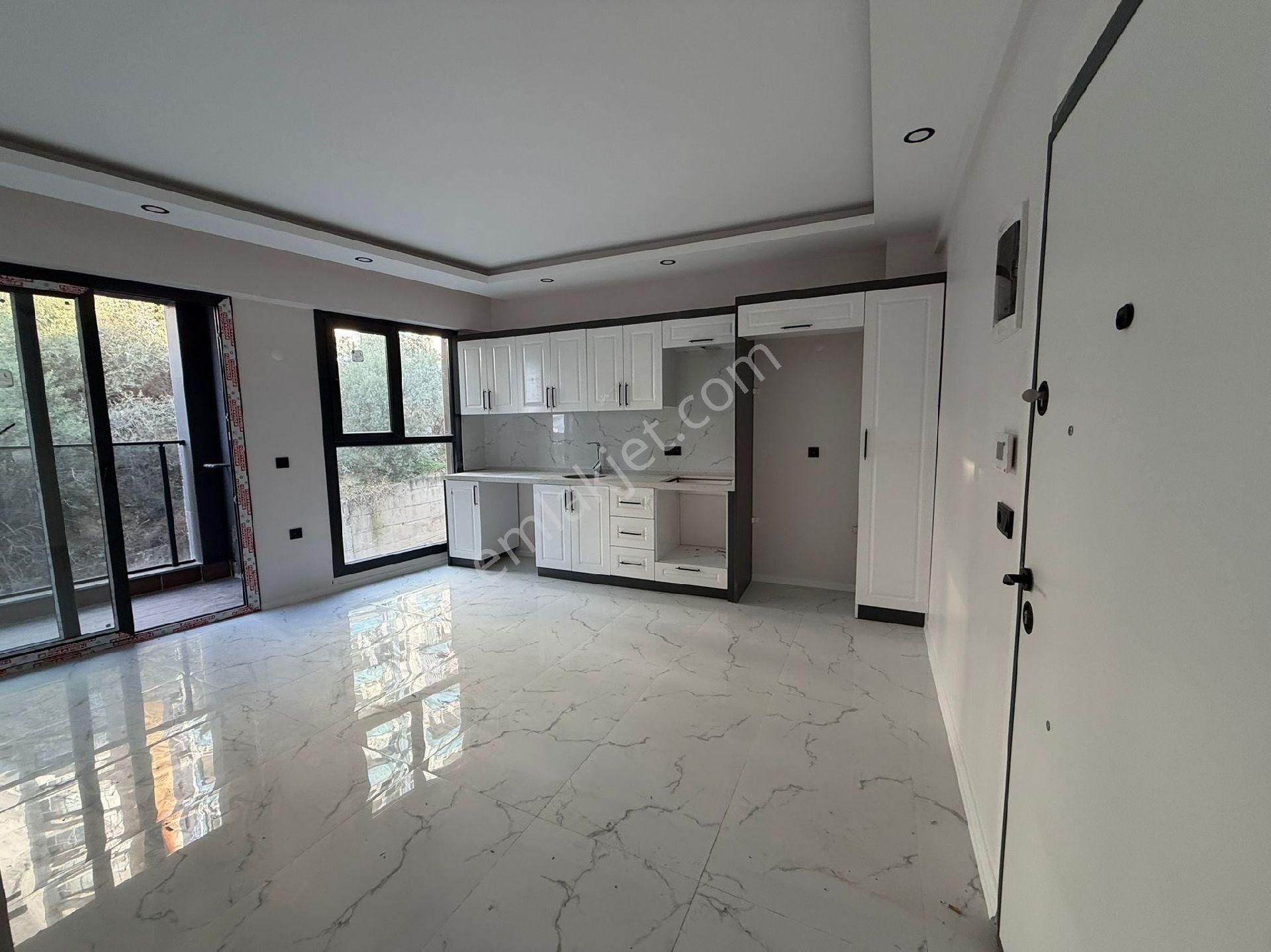 Kuşadası Ege Mahallesinde Mantolamalı 3.ncü Kat Yerden Isıtmalı Satılık Sıfır 1+1 Daire - Görsel 10