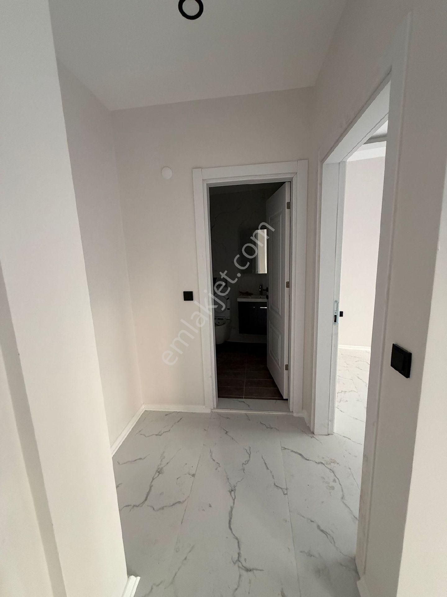 Kuşadası Ege Mahallesinde Mantolamalı 3.ncü Kat Yerden Isıtmalı Satılık Sıfır 1+1 Daire - Görsel 11