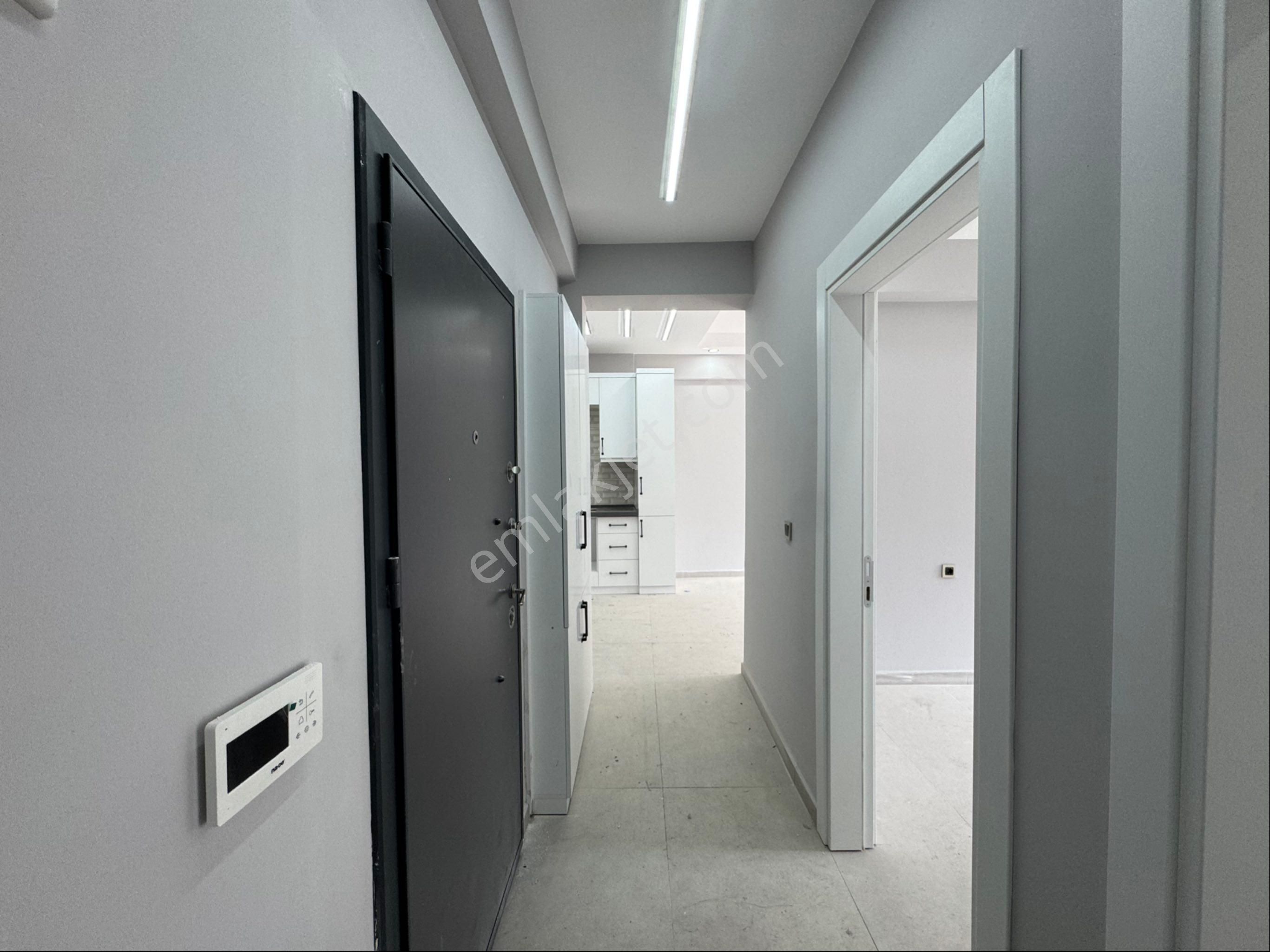 Kuşadası Güzelçamlı'da Satılık 2+1 Ara Kat Sıfır Daire