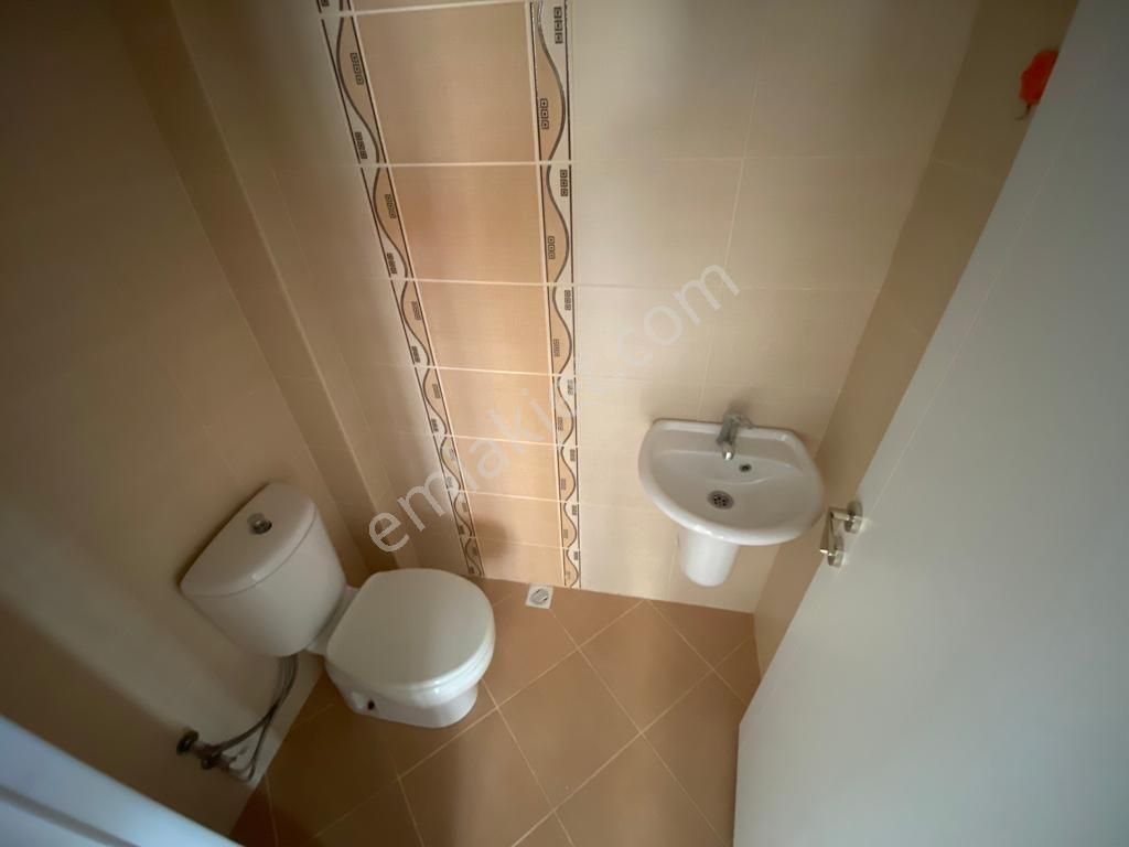 Tamiş'den Altayçeşme'de Yatırımlık Binada Balkonlu 1.katta 2+1 - Görsel 16