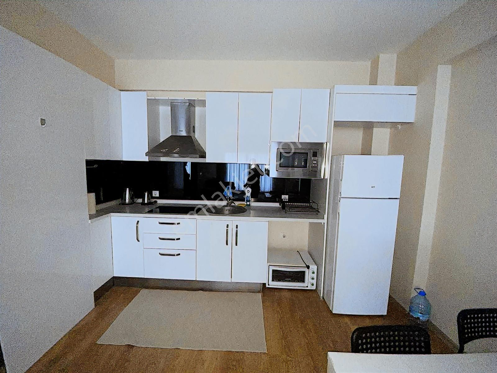 Torbalı'da Havuzlu Sitede Kiralık Eşyalı Ara Kat 1+1 Daire - Görsel 21