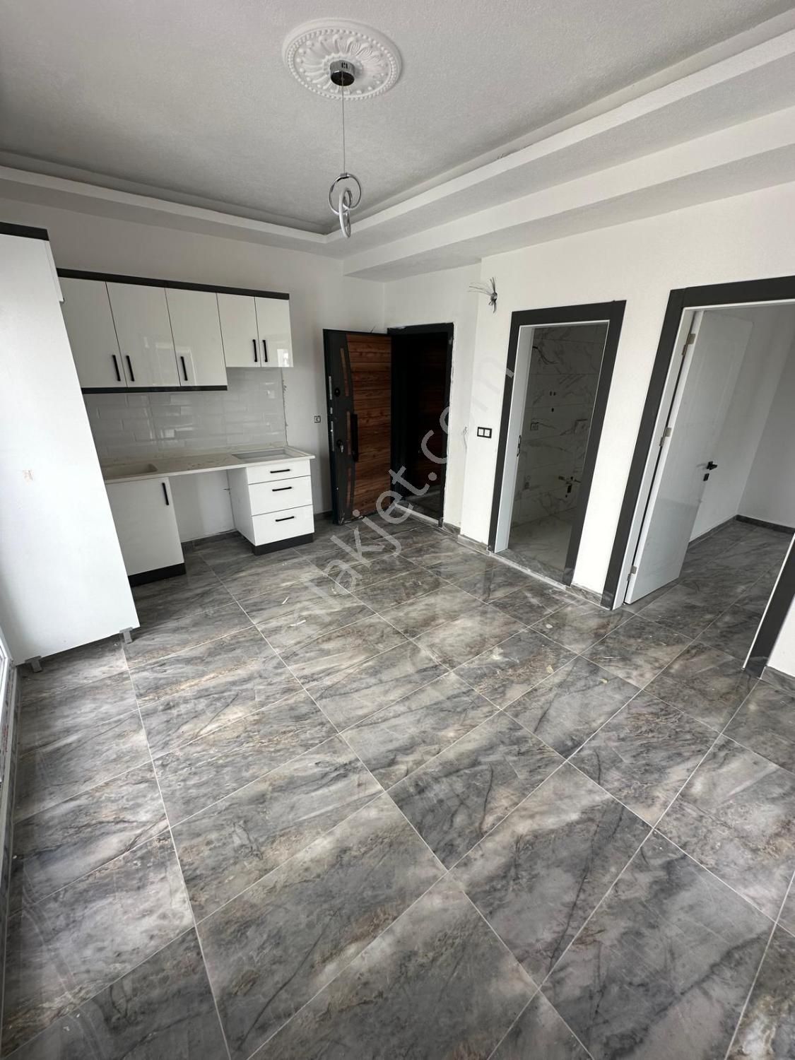 Didim Hisar Mahallesin'de Asansörlü Uygun Fiyata Sıfır 1+1 Daire