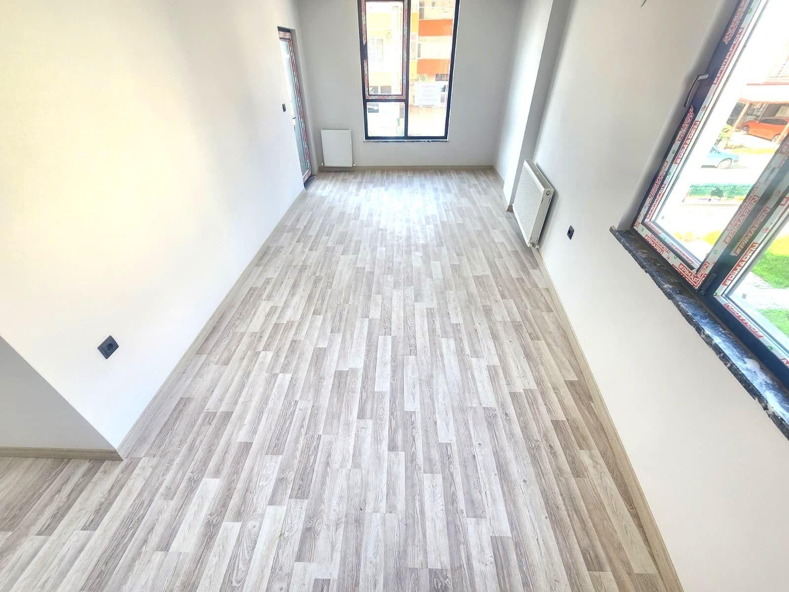 Burhaniye Bahçelievler Tam Merkezi Lokasyonda Sıfır Ara Kat Ön Cephe Ayrı Mutfak 2+1 Satılık Dairele - Görsel 14