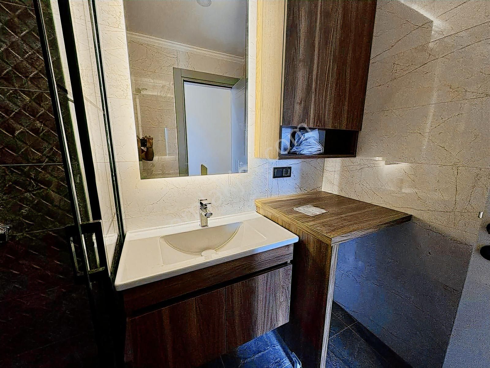 Davutlar'da Önü Açık Yerden Isıtmalı Otomatik Panjurlu 2+1 Daire - Görsel 16