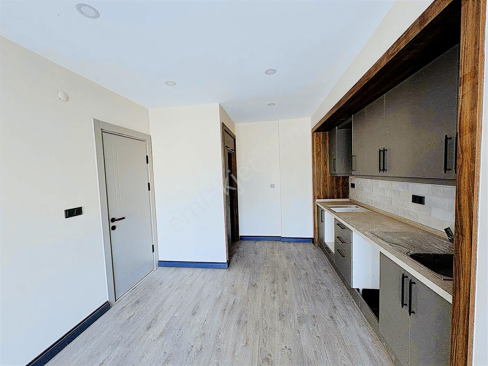 Davutlar'da Önü Açık Yerden Isıtmalı Otomatik Panjurlu 2+1 Daire - Görsel 13