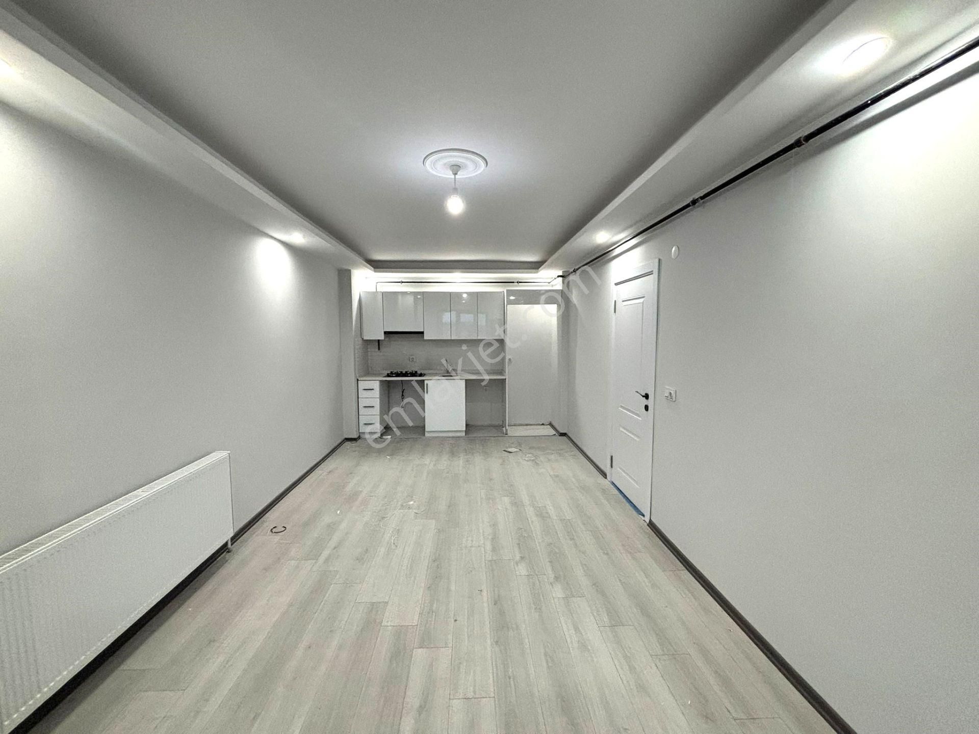 **eryıldız İnşaat'tan**acill Kombili Ankastreli K.otoparklı 1+1*