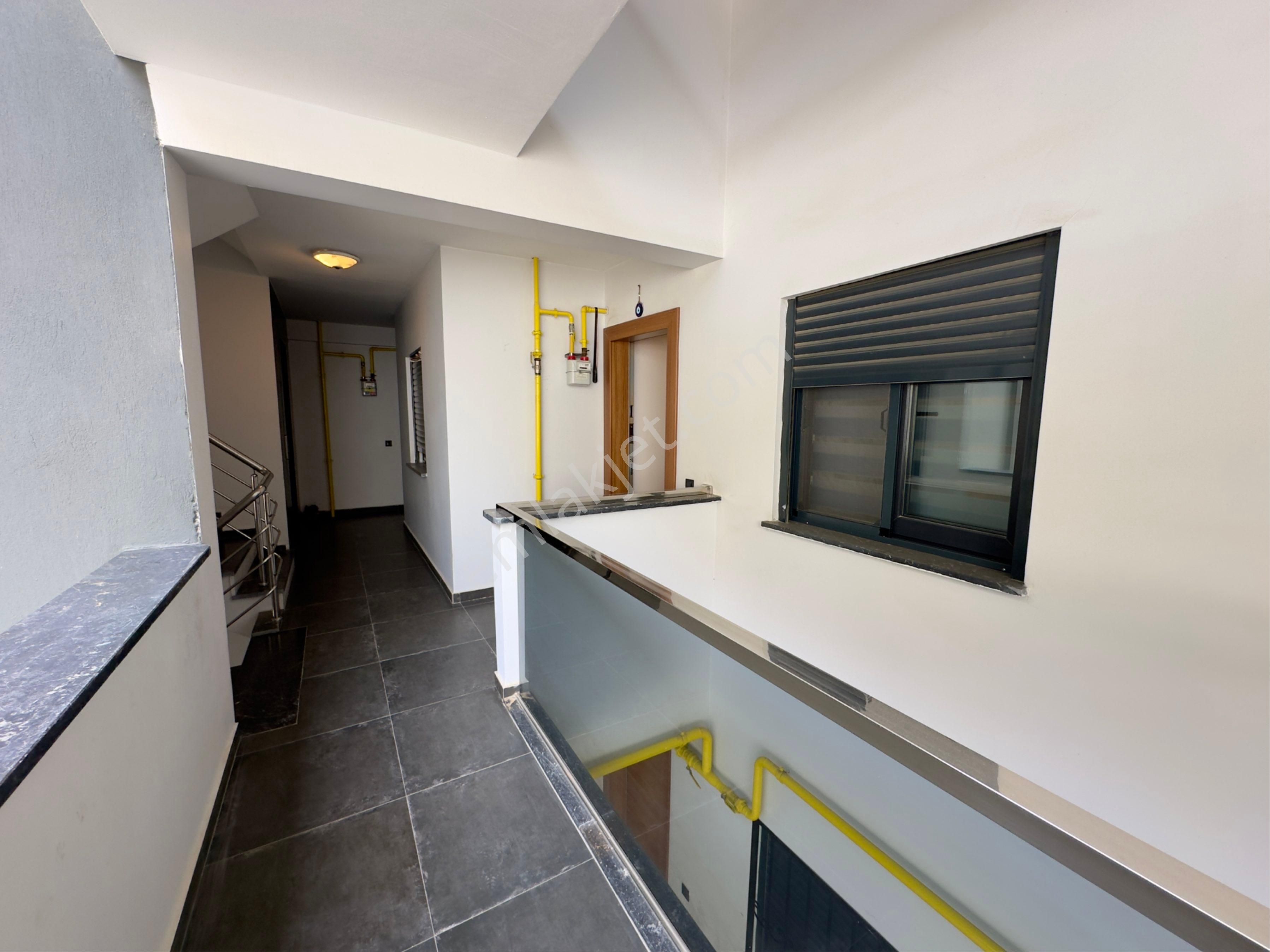 Kuşadası Kadınlar Denizinde Deniz Manzaralı 1+1 Daire - Görsel 31