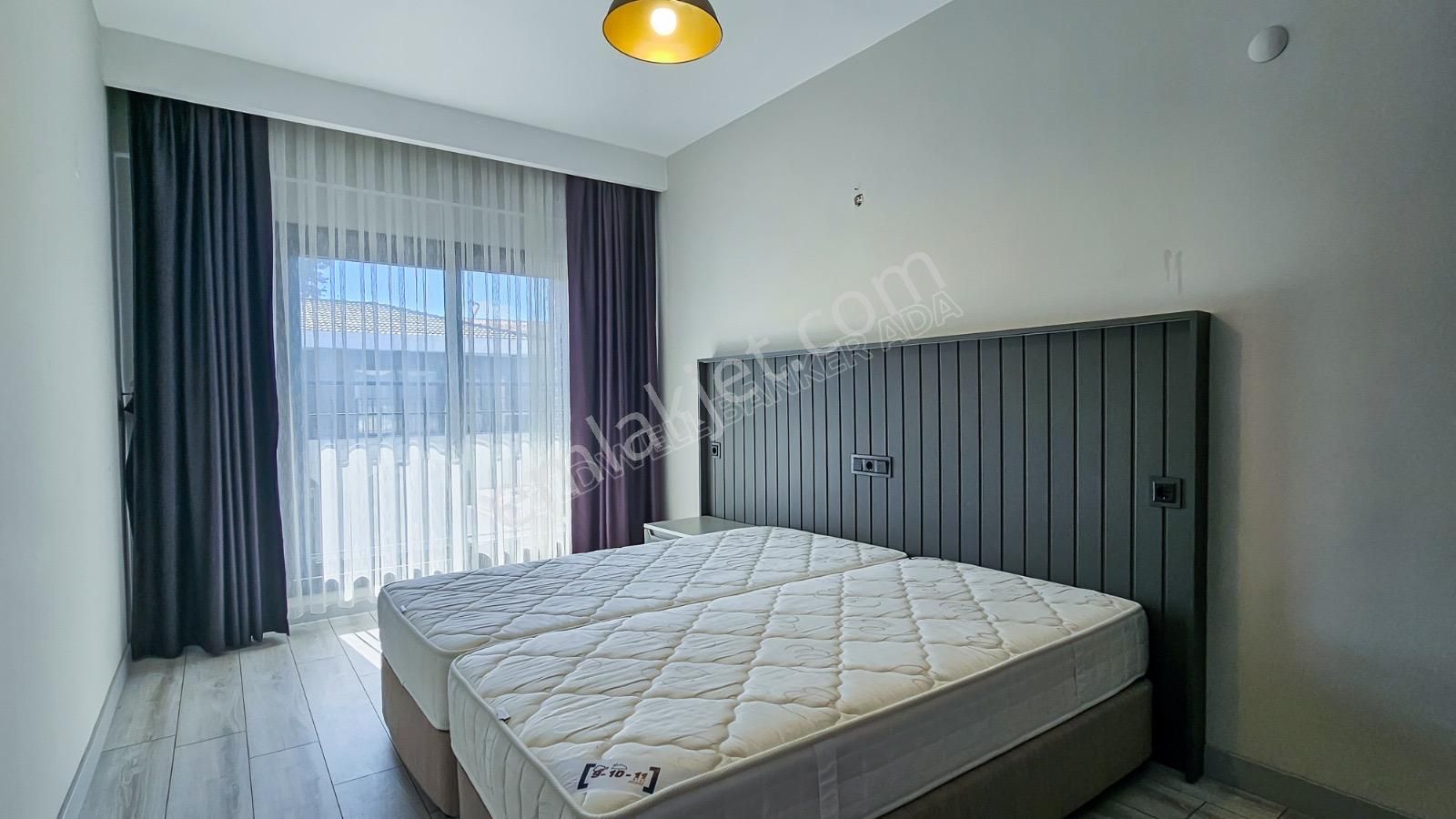 Kuşadası Kuştur Plajı ‘na Yürüme Mesafesinde 1+1 Şık Eşyalı Kiralık Daire - Görsel 34