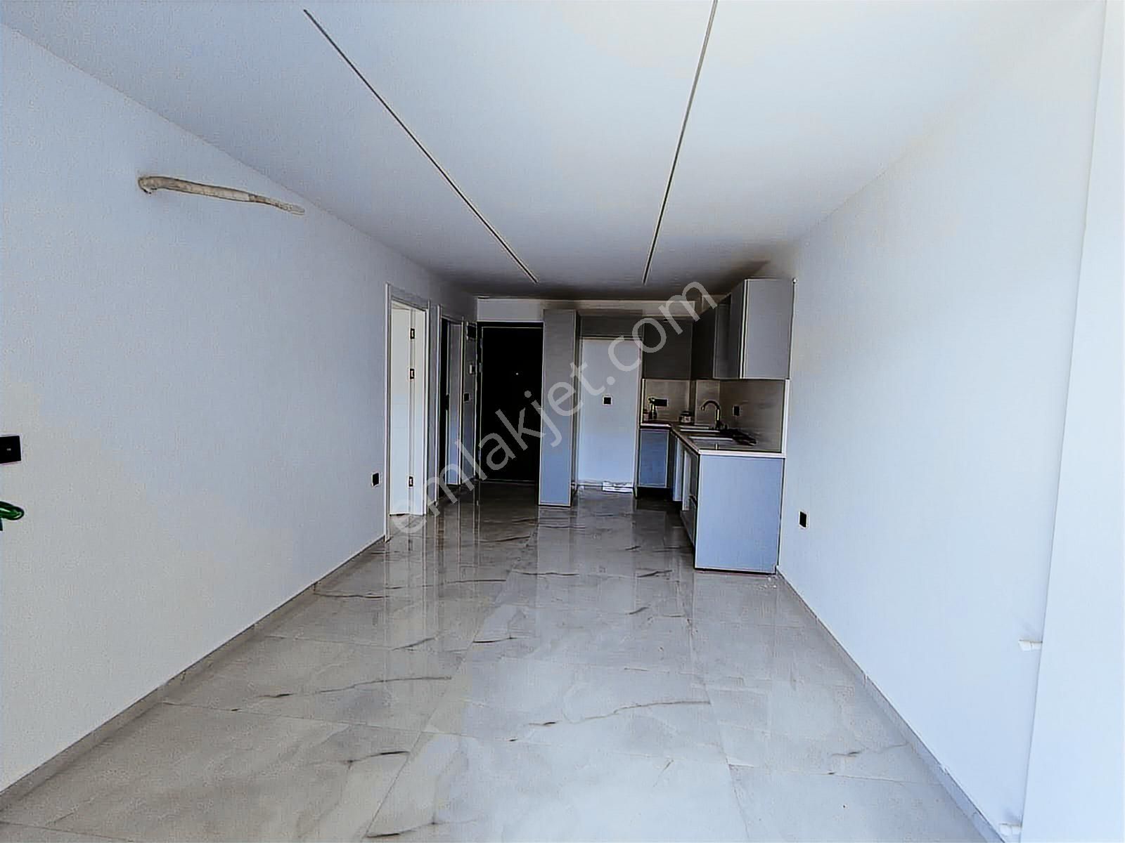 Akbük Merkezde Satılık 1+1 Sıfır Daire - Görsel 10