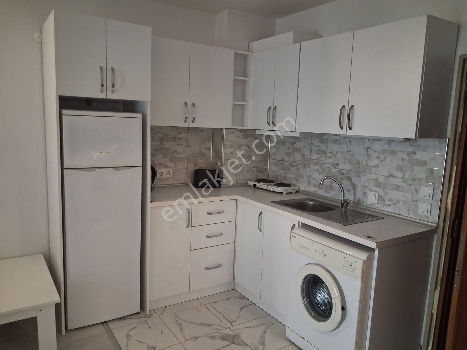 Kuşadasında Otogar Arkası Merkez De Havuzlu Sitede Eşyalı 1+1 - Görsel 26