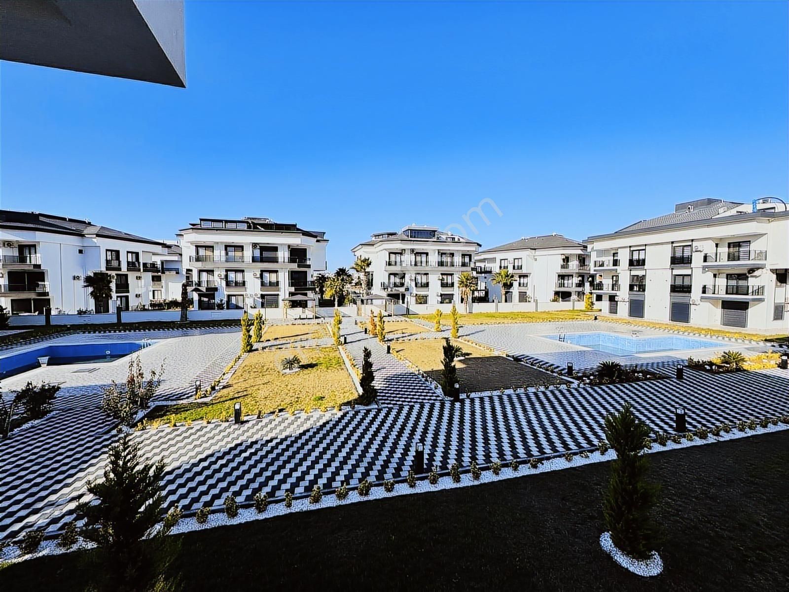 Didimde Satılık Havuzlu Güvenlikli Sitede Uygun Fiyata 1+1 Daire