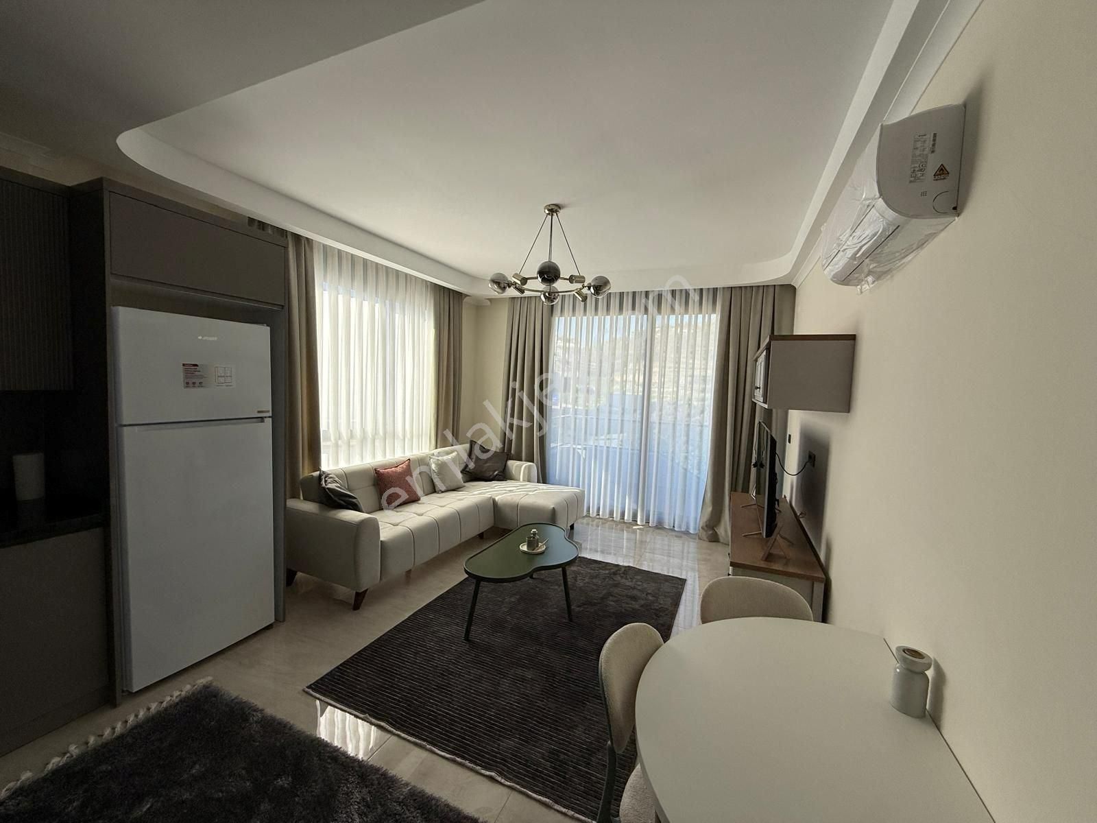 Alanya Cikcilli’de Sosyal Olanaklı Sitede 1+1 Satılık Daire