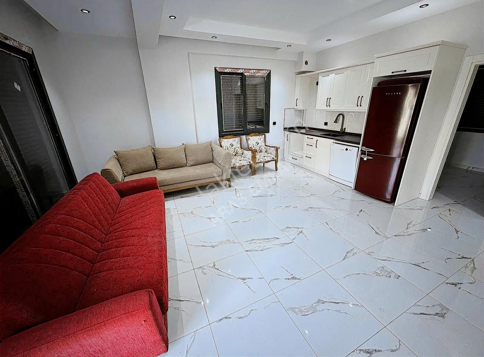 Tasyaka'da Mustakil Girisli Modern 1+1 Daire - Görsel 18