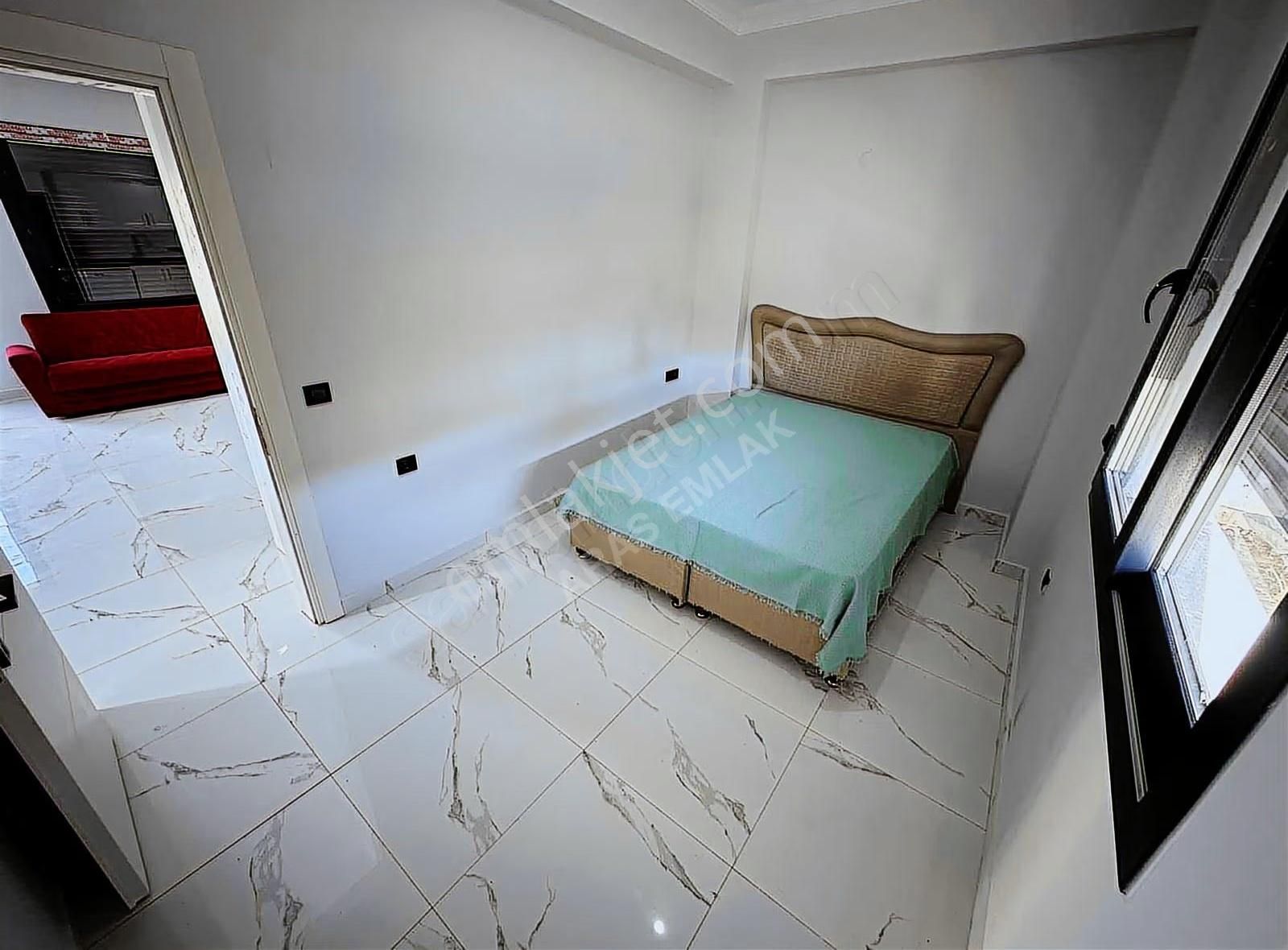 Tasyaka'da Mustakil Girisli Modern 1+1 Daire - Görsel 21