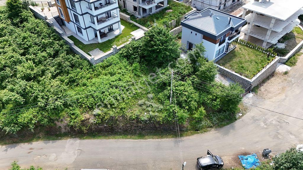 Abdi Bostan Gayrimenkul'den Akçaabat Söğütlü'de Cephesi Geniş Satılık Arsa
