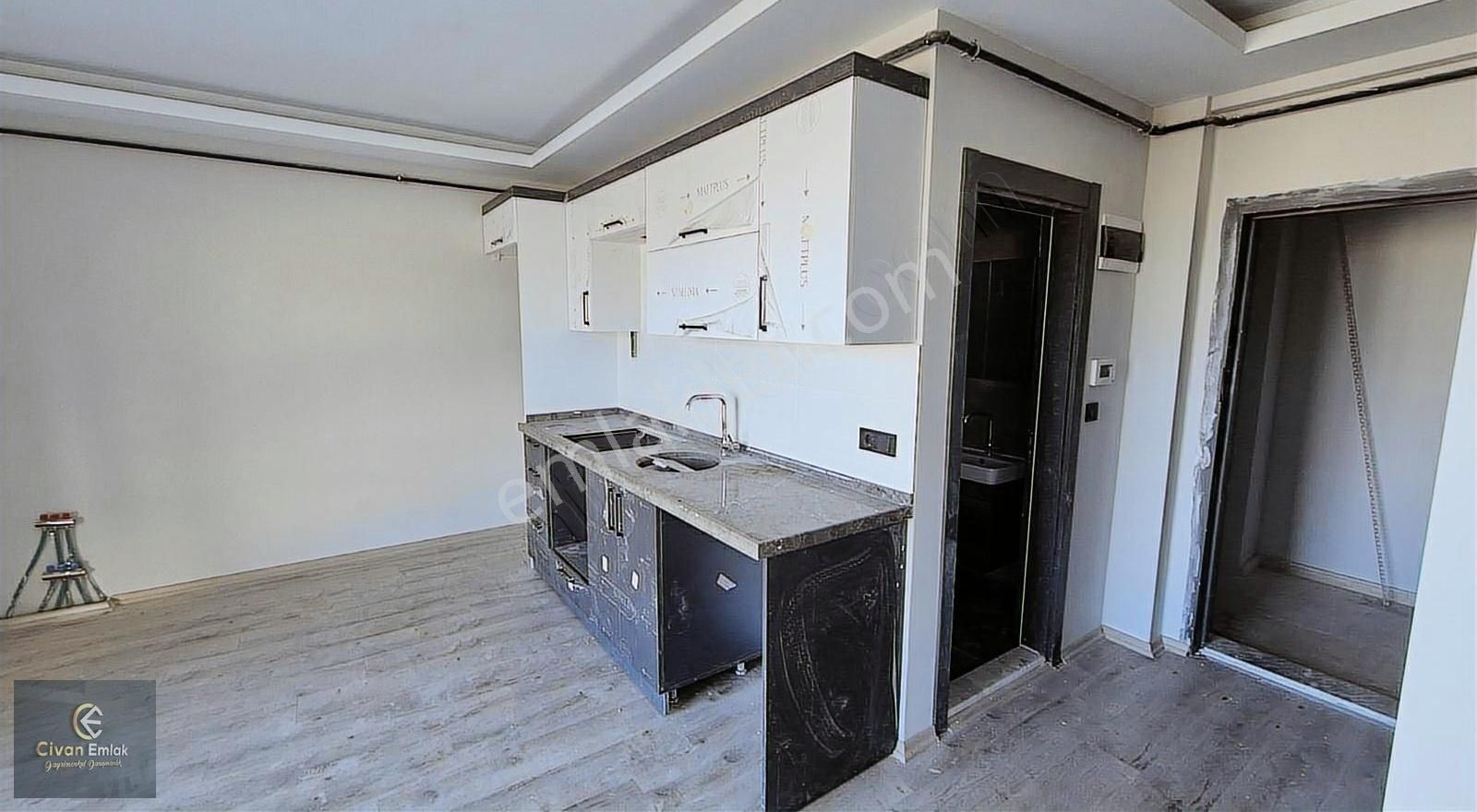 Civandan Toplukonutta Deniz Manzaralı Yerden Isıtma Satılık 1+1 - Görsel 9