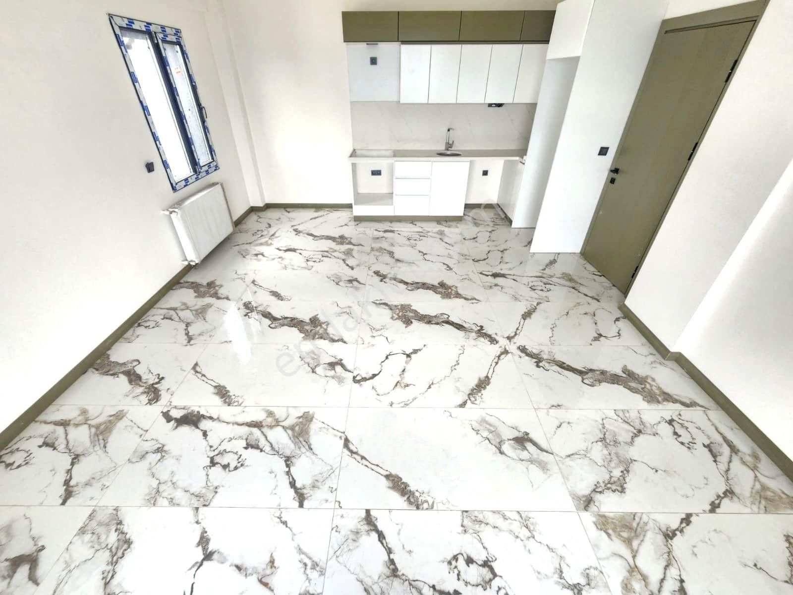 Aygülden Burhaniye Bahçelievler'de Sıfır Kat Ve Cephe Seçenekleriyle Doğalgazlı 1+1 Satılık Daireler - Görsel 11