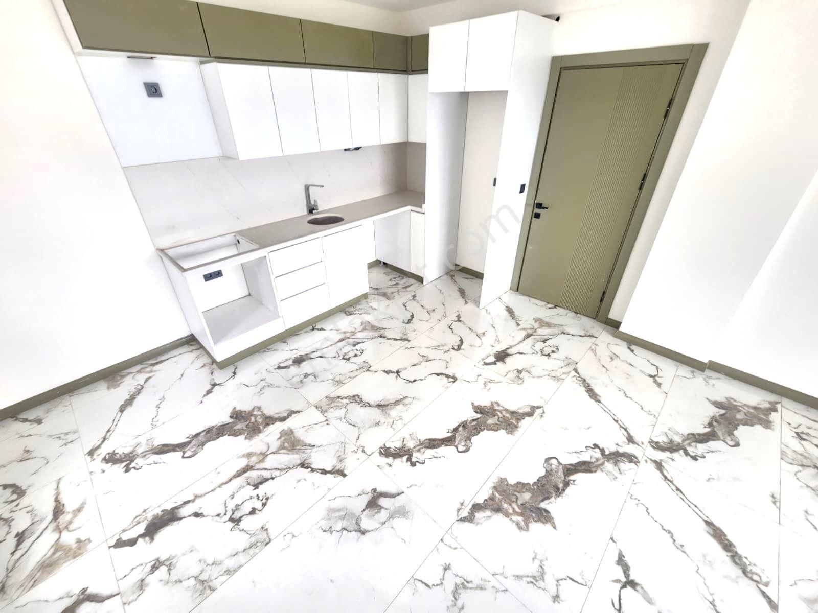 Aygülden Burhaniye Bahçelievler'de Sıfır Kat Ve Cephe Seçenekleriyle Doğalgazlı 1+1 Satılık Daireler - Görsel 10