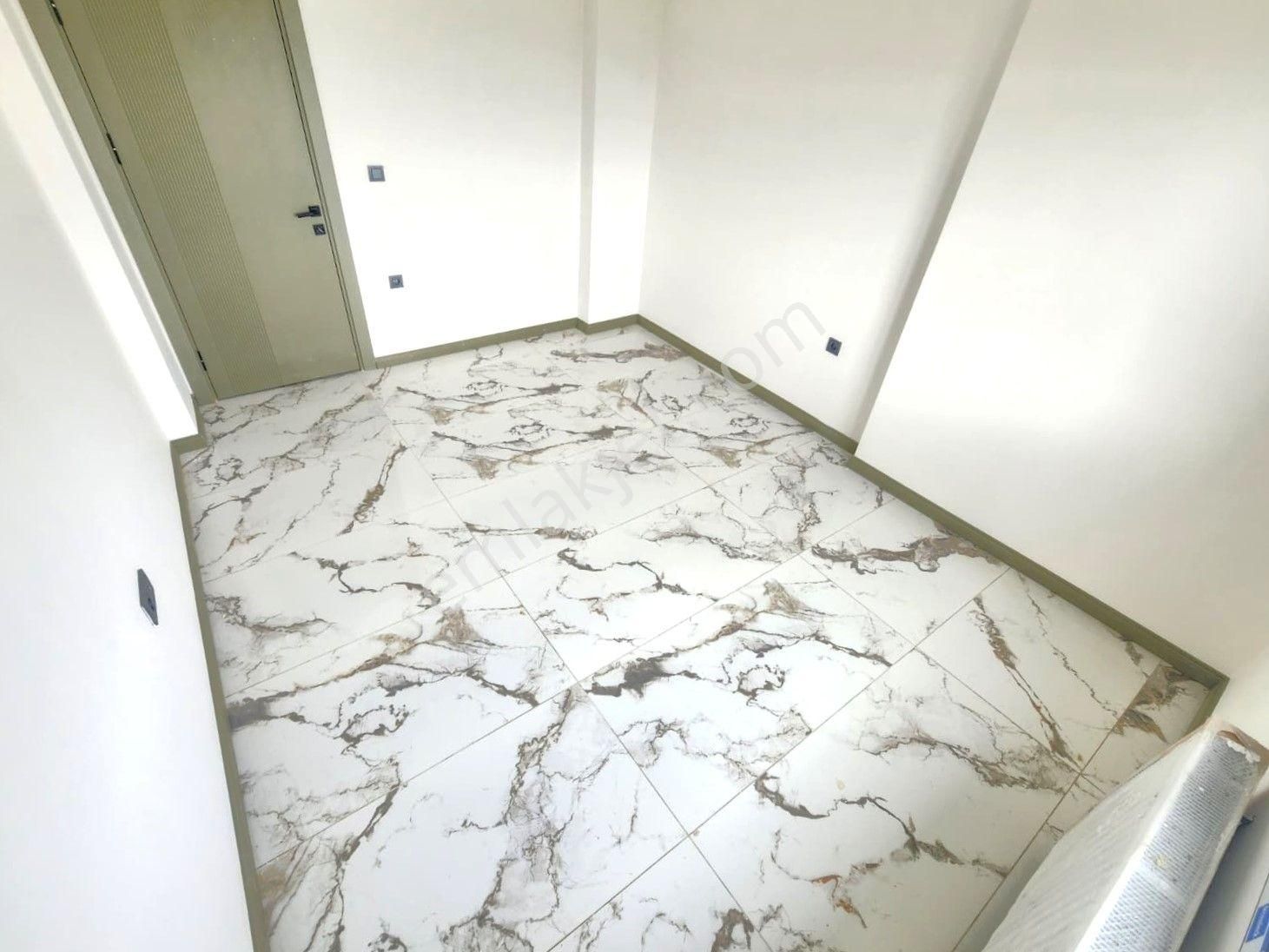 Aygülden Burhaniye Bahçelievler'de Sıfır Kat Ve Cephe Seçenekleriyle Doğalgazlı 1+1 Satılık Daireler - Görsel 19