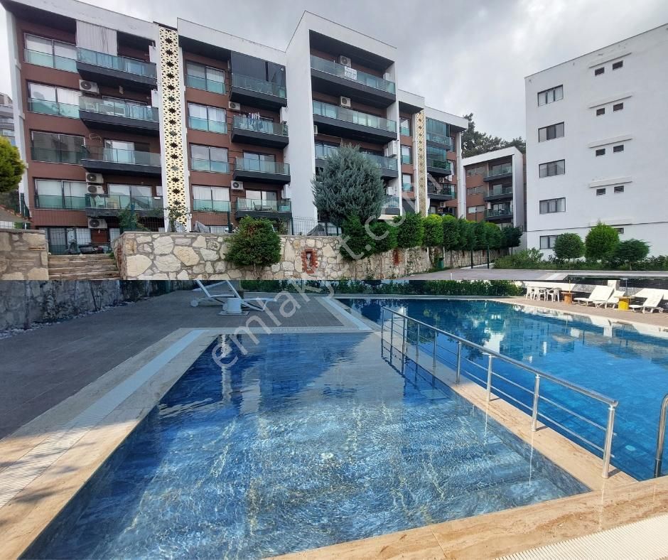 Kuşadası'nda Havuzlu St Doğalgazlı Arakat 2+1 Satılık Rezidans