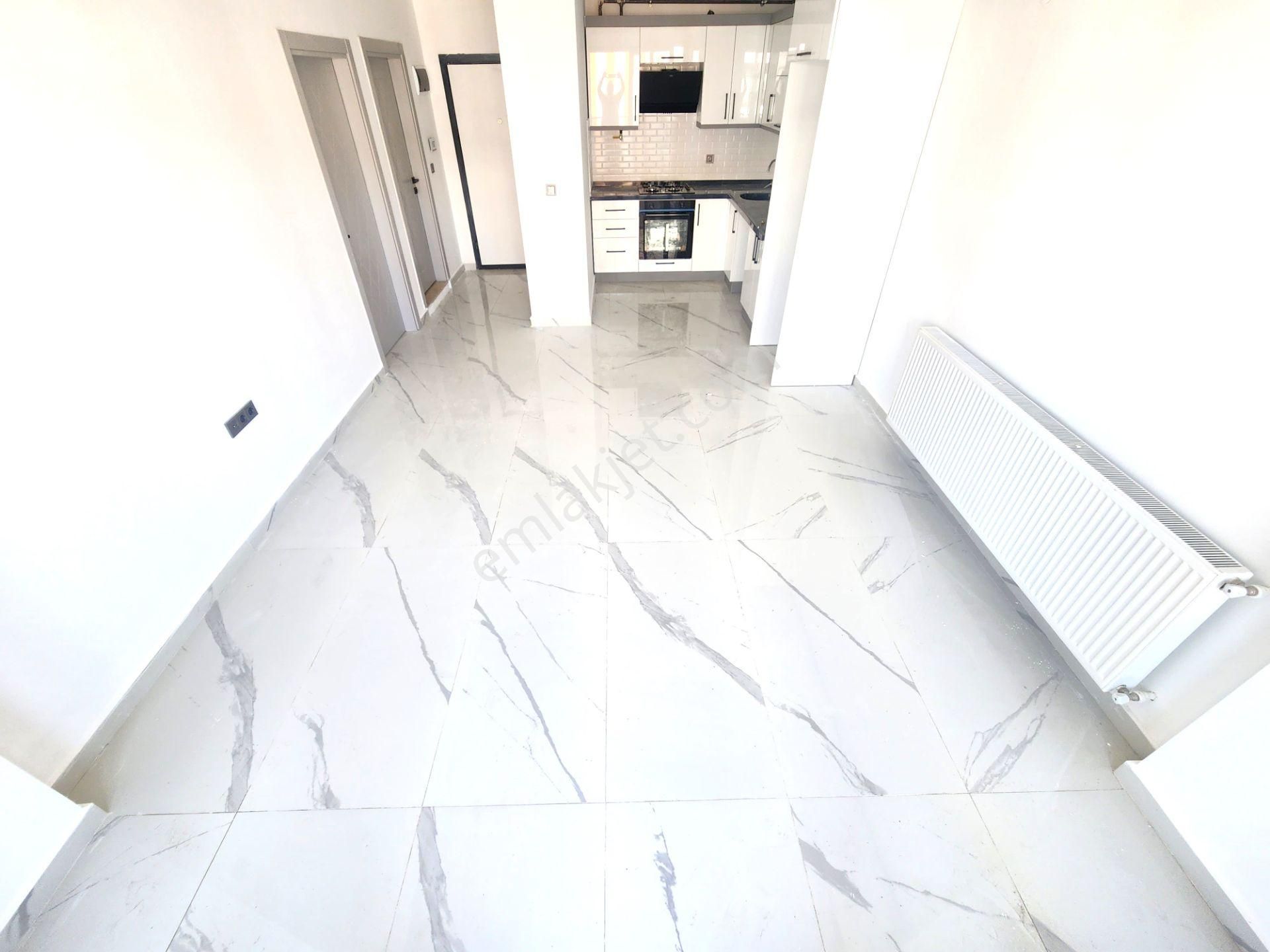 👉burhaniye Ören'de Nezih Site İçi Havuzlu Güvenlikli Ara Kat Doğalgazlı Asansörlü 1+1 Satılık Daire - Görsel 2