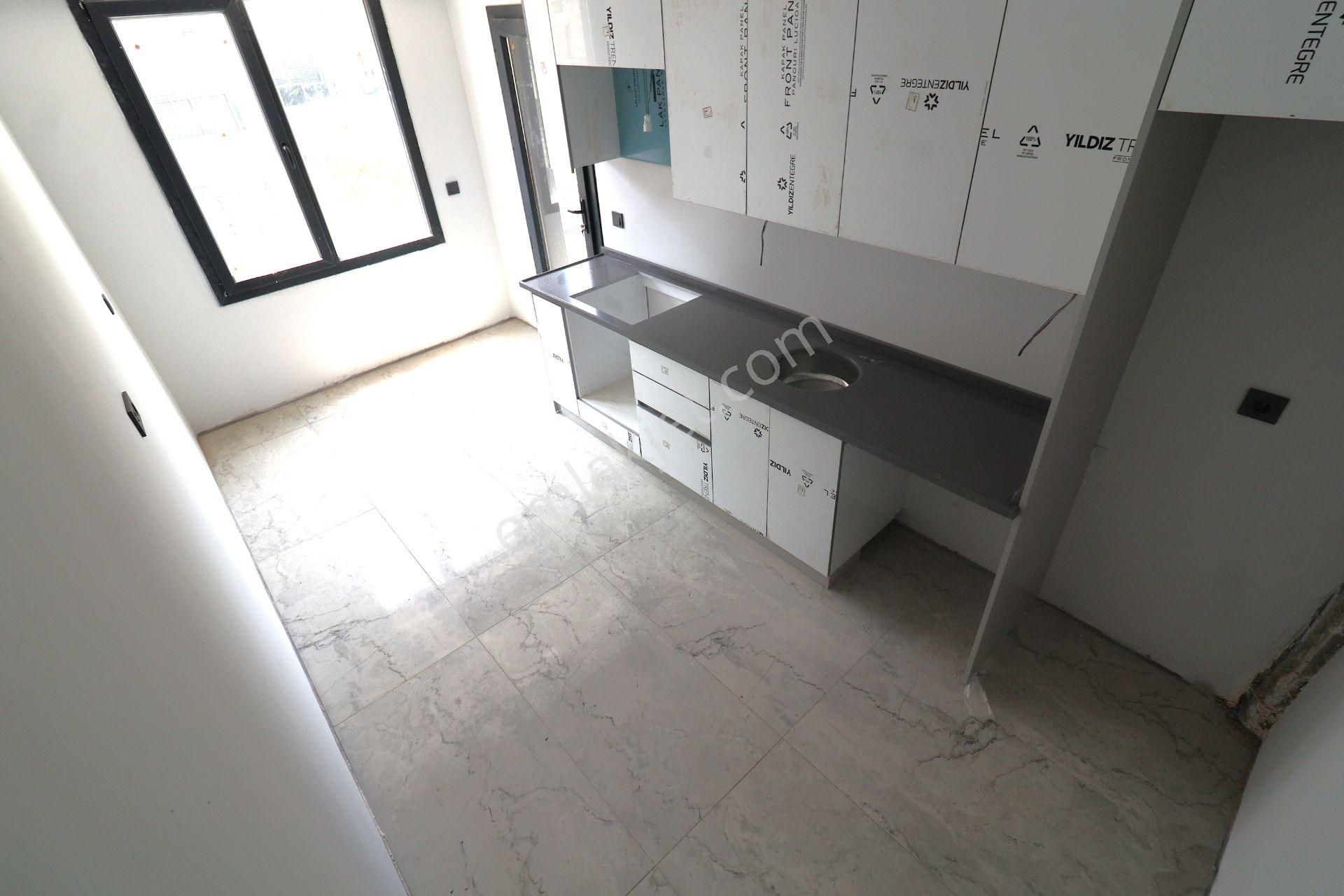 Akçay Merkez Kordon'da Aygül'den Kat Ve Cephe Seçenekleriyle Sıfır Denize Yakın 2+1 Satılık Daireler