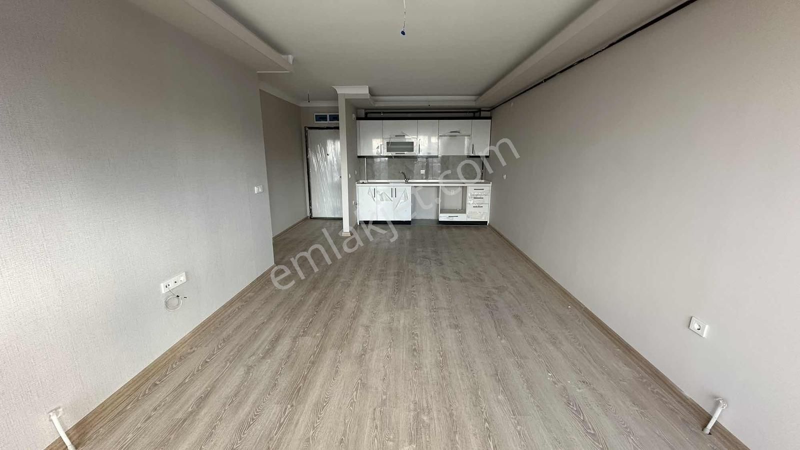Alaçatı'dan Yüksek Kredili/iskanlı/geniş Oturumlu Lüks 1+1
