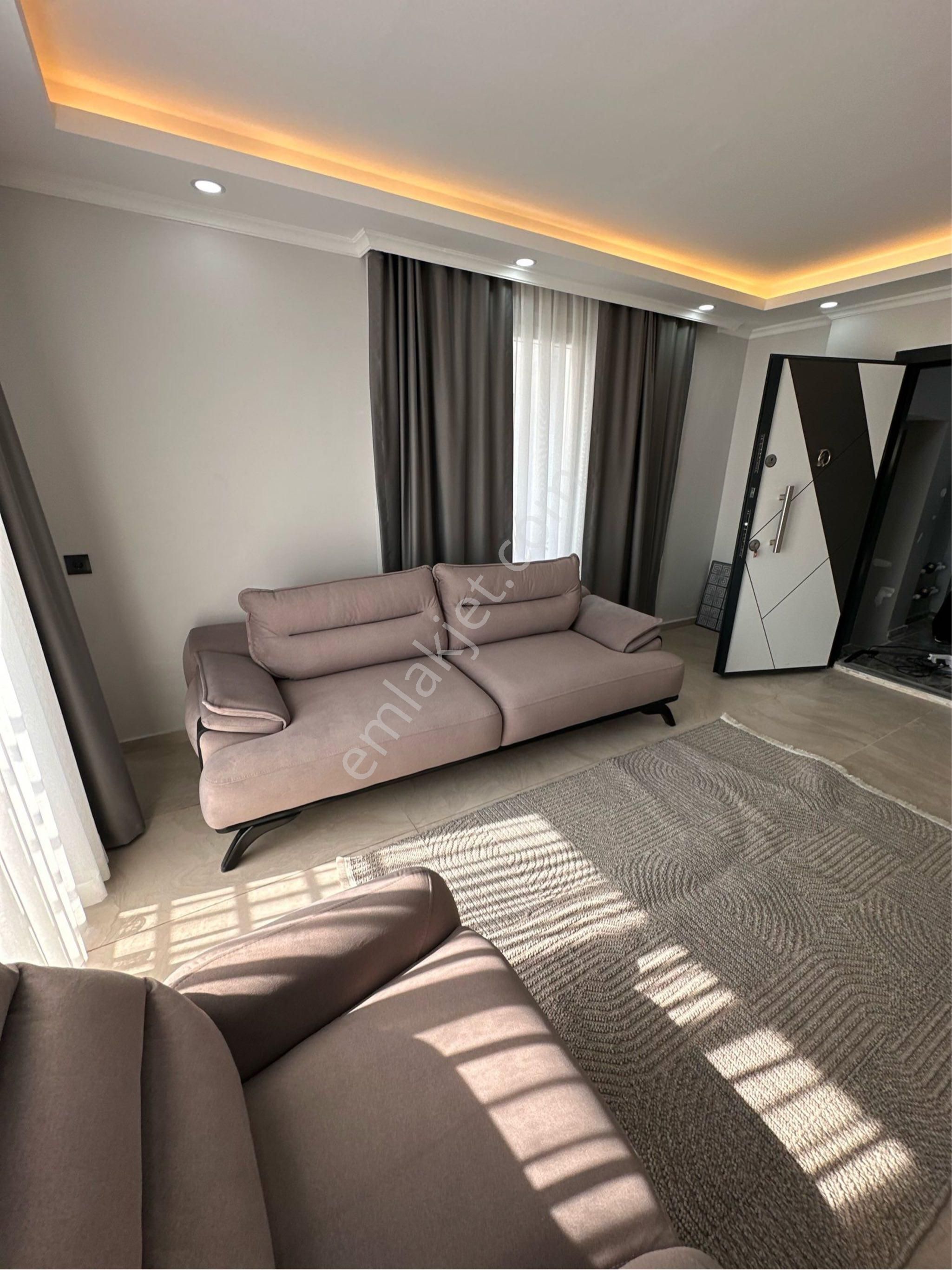 Güzelyalı’da Merkezi Konumda Sıfır 1+1 Eşyalı Kiralık Daire