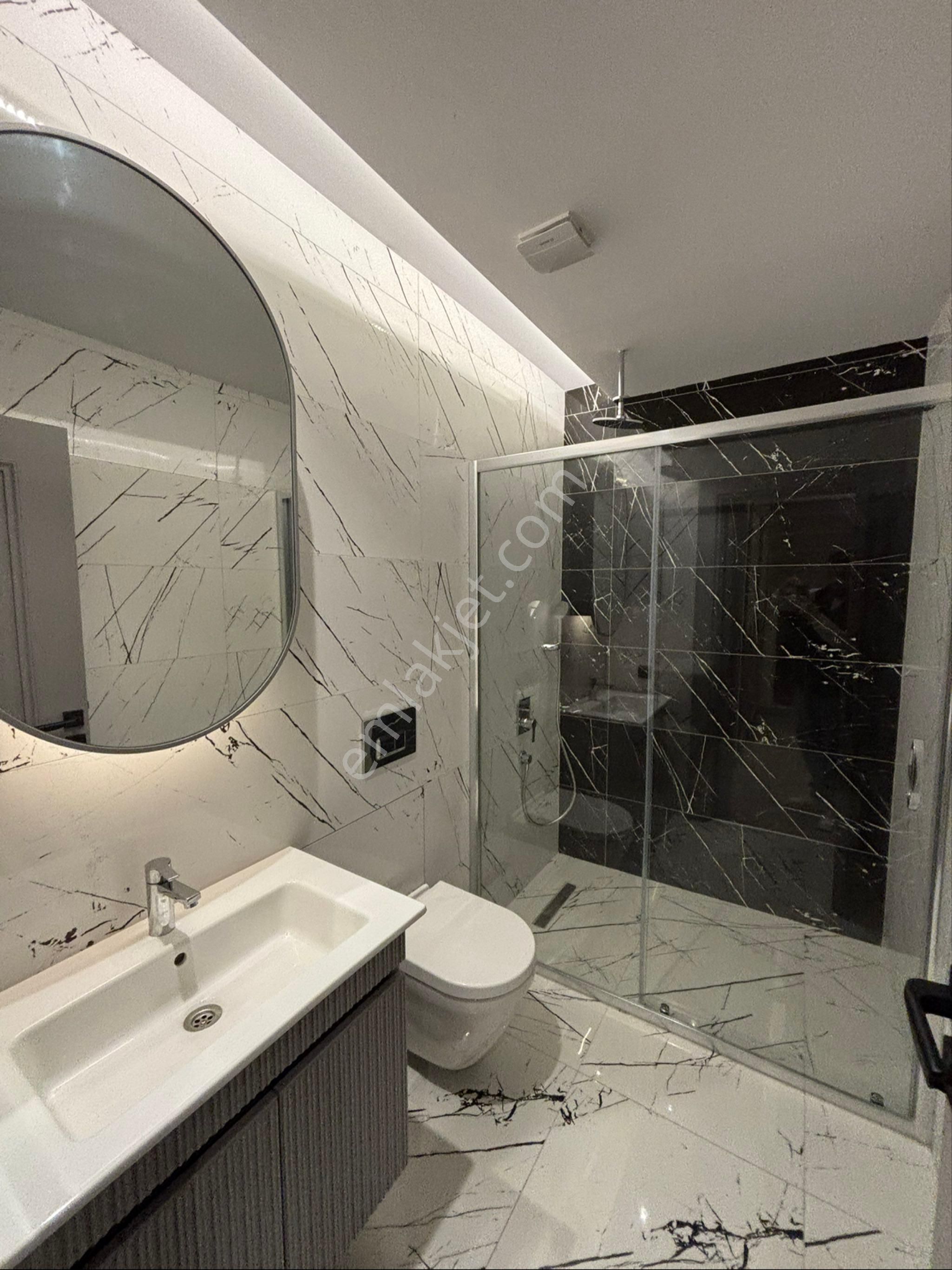 Kuşadasında Merkezde Düz Ayak 3+1 Lüks Modern Satılık Geniş Daire - Görsel 27