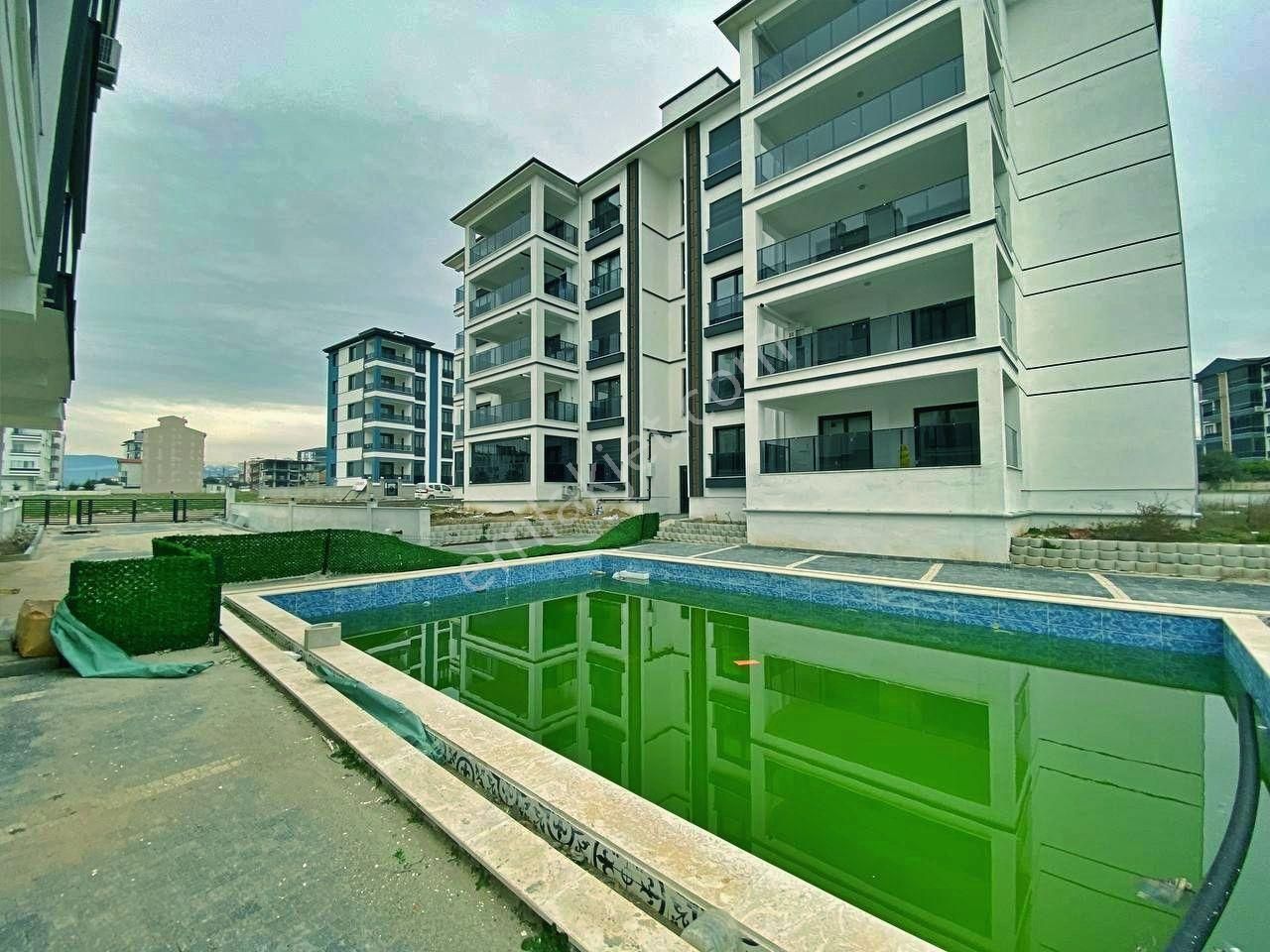 Uytundan Burhaniye Badem Alanında Havuzlu Sitede Arakat 2+1daire - Görsel 15