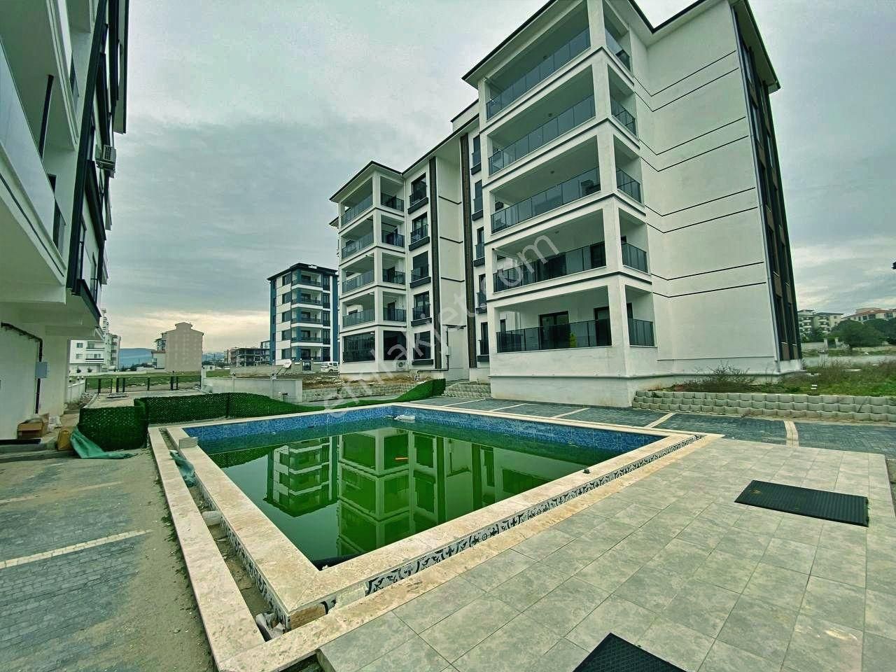 Uytundan Burhaniye Badem Alanında Havuzlu Sitede Arakat 2+1daire - Görsel 30