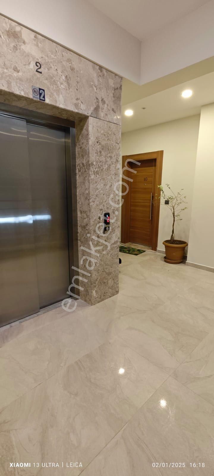 Davutlar'da Merkez'de 1+1 Yerden Isıtmalı Sıfır Satılık Daire - Görsel 10