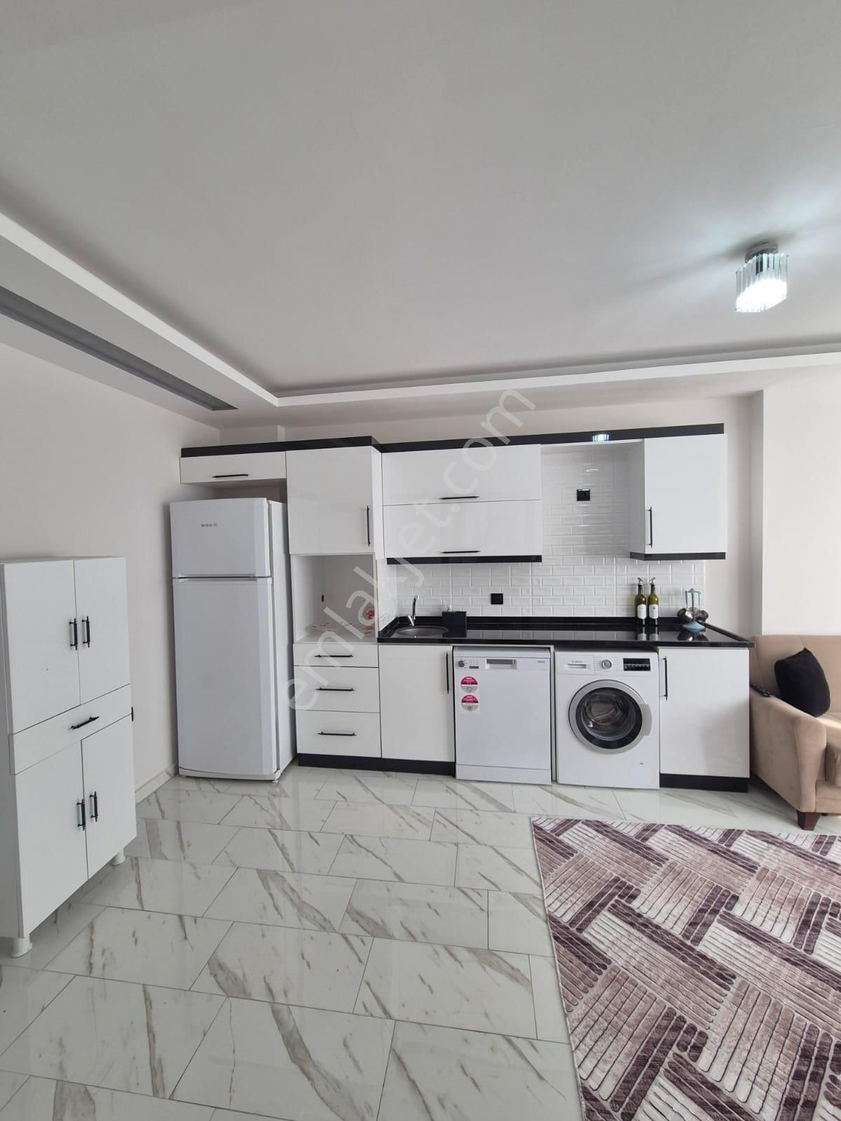 Gültepe'de 1+1 Full Ve Sıfır Eşyalı Geniş Oturumlu Kiralık Daire - Görsel 11