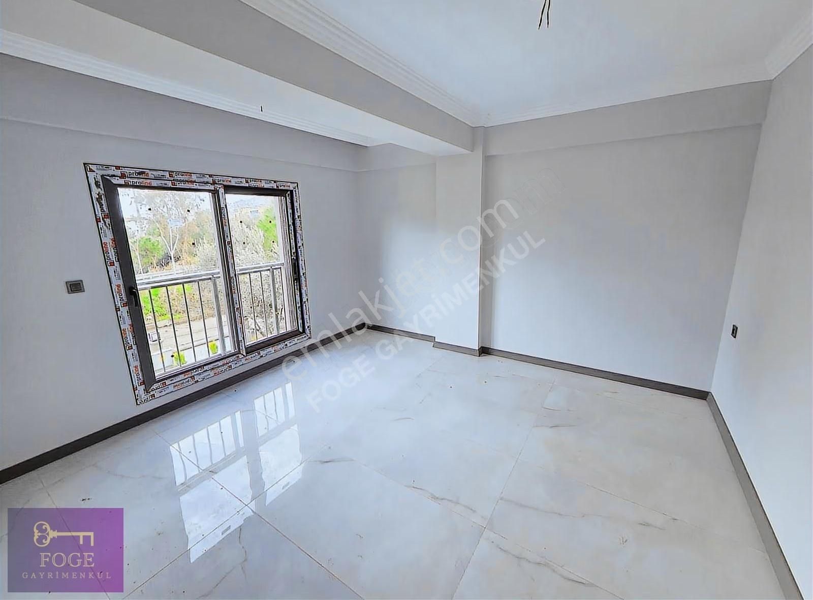 Yenifoça'da Gözde Konumda Sıfır Kiralık Açık Teraslı 2+1 Daire - Görsel 24