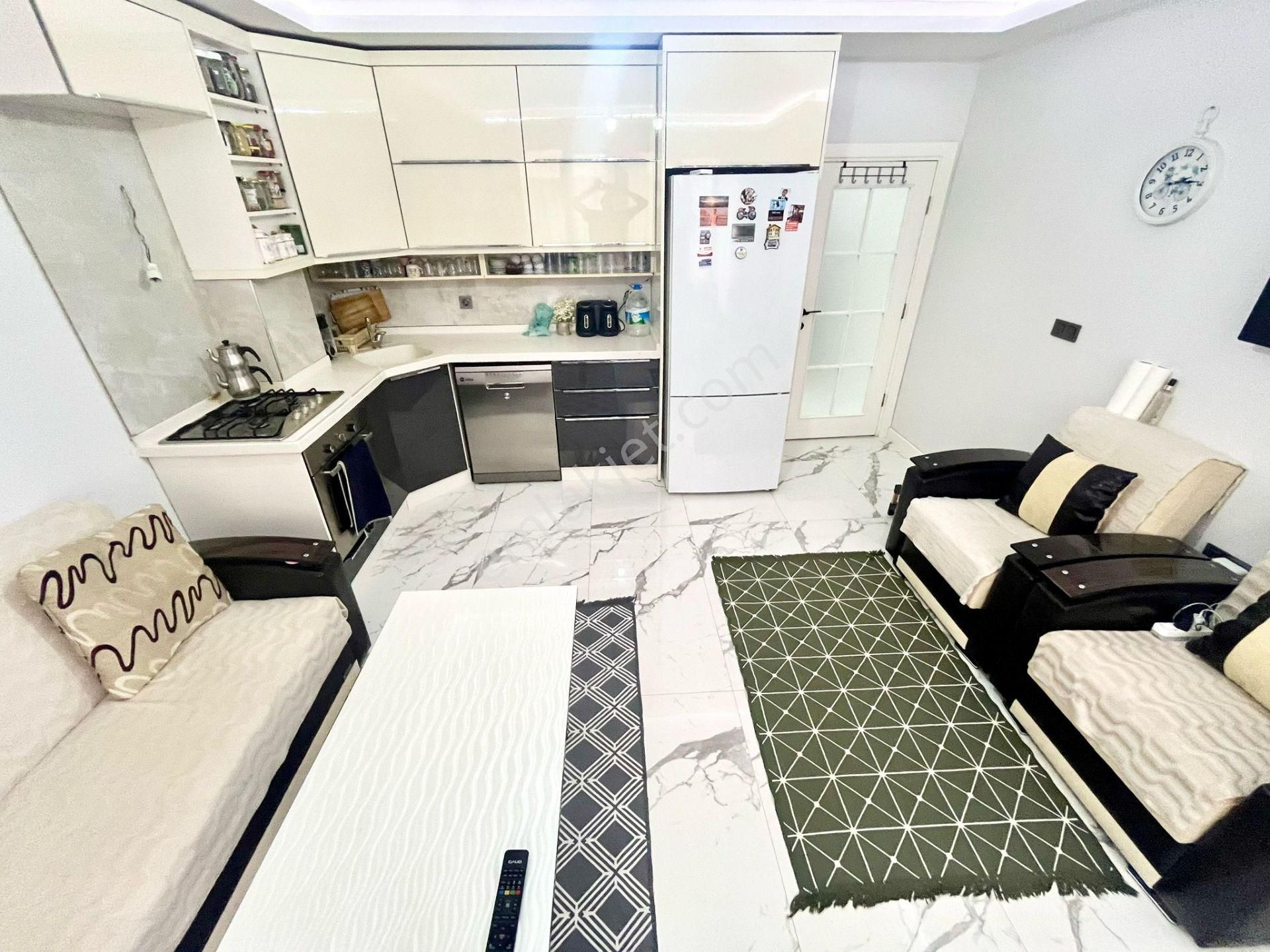 Dora,dan Akçay,da Bahçe Kullanımlı Satılık 1+1 Daire