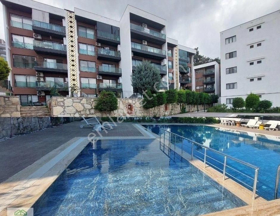 Kuşadası'nda Havuzlu St Doğalgazlı Arakat 2+1 Satılık Rezidans