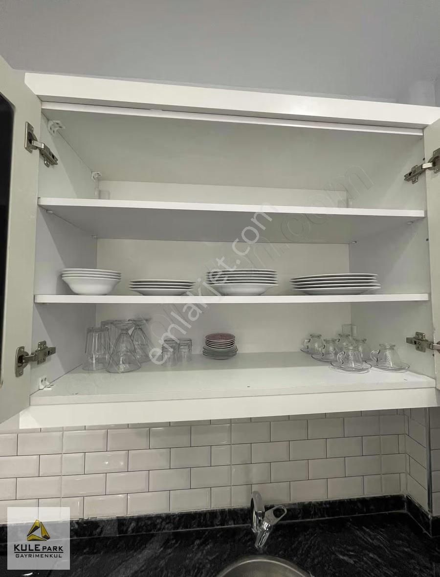 Gültepe`de~1+1~full~sıfır~eşyalı~geniş~oturumlu~az~katlı~daire~